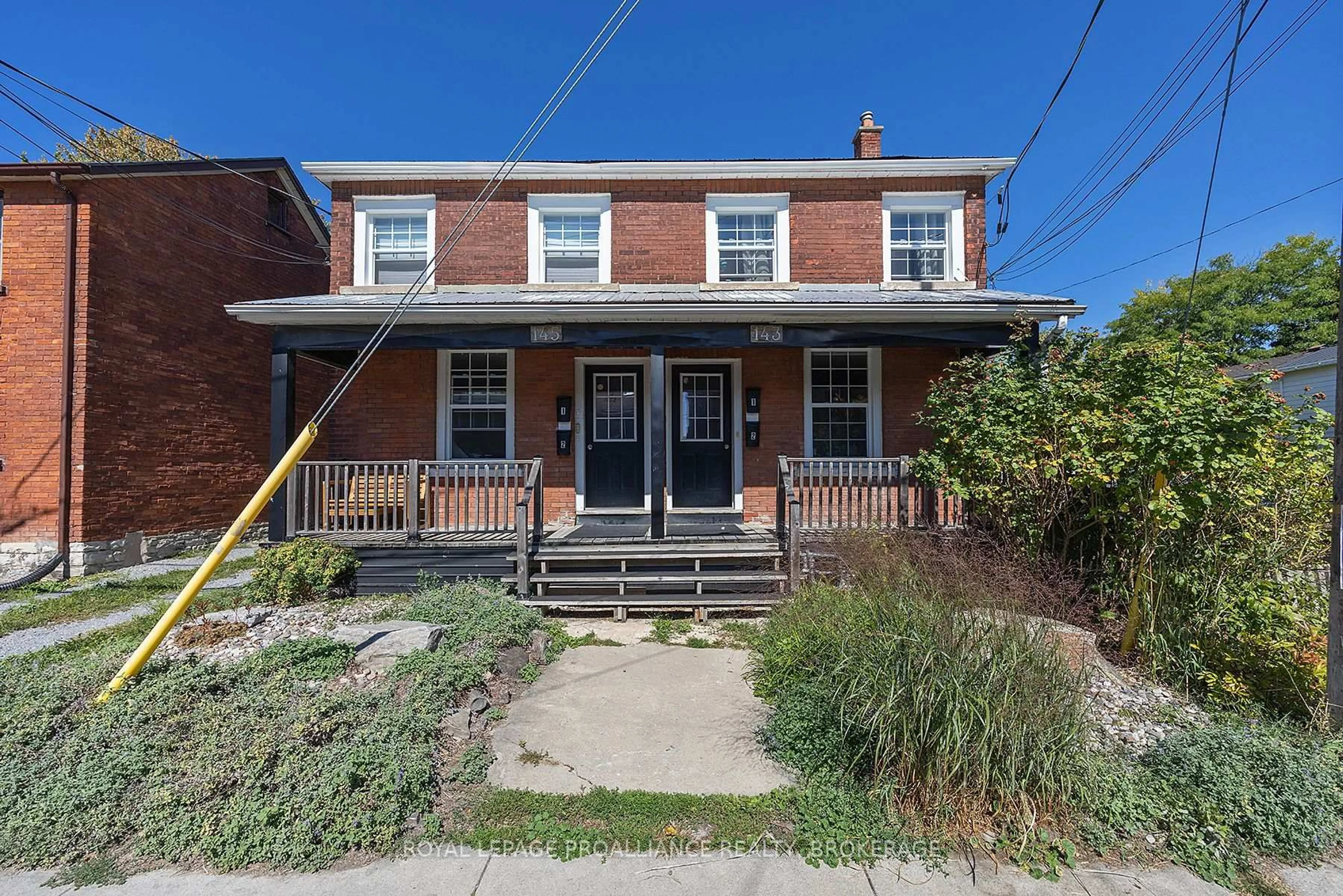 Home with brick exterior material, street for 143-145 Ordnance St, Kingston Ontario K7K 1G9