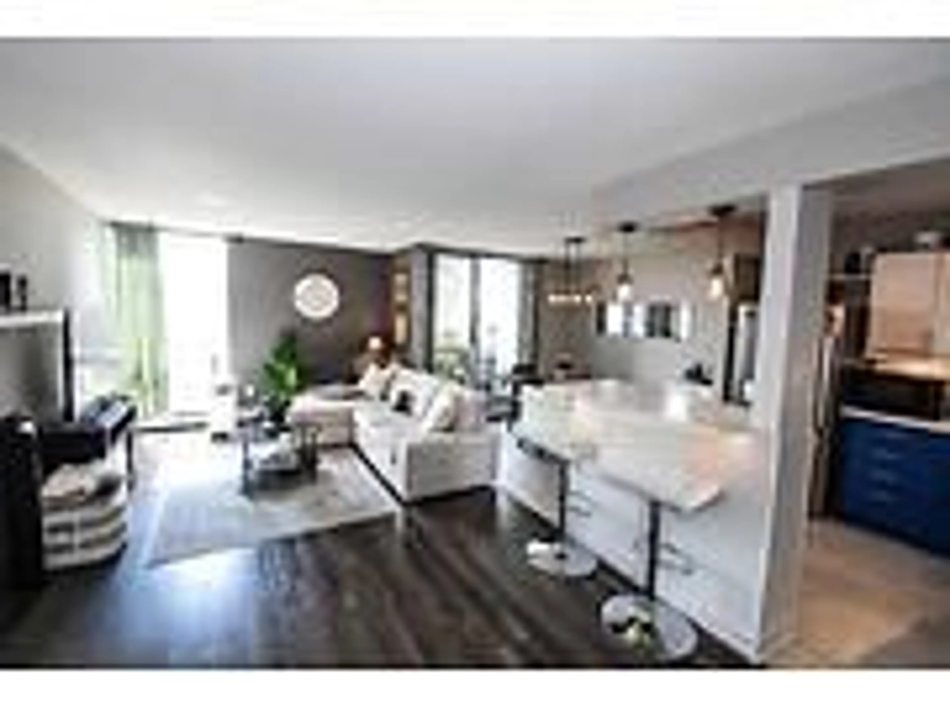 Open concept kitchen, wood/laminate floor for 75 Glenburn Crt #811, Hamilton Ontario L8E 1C7