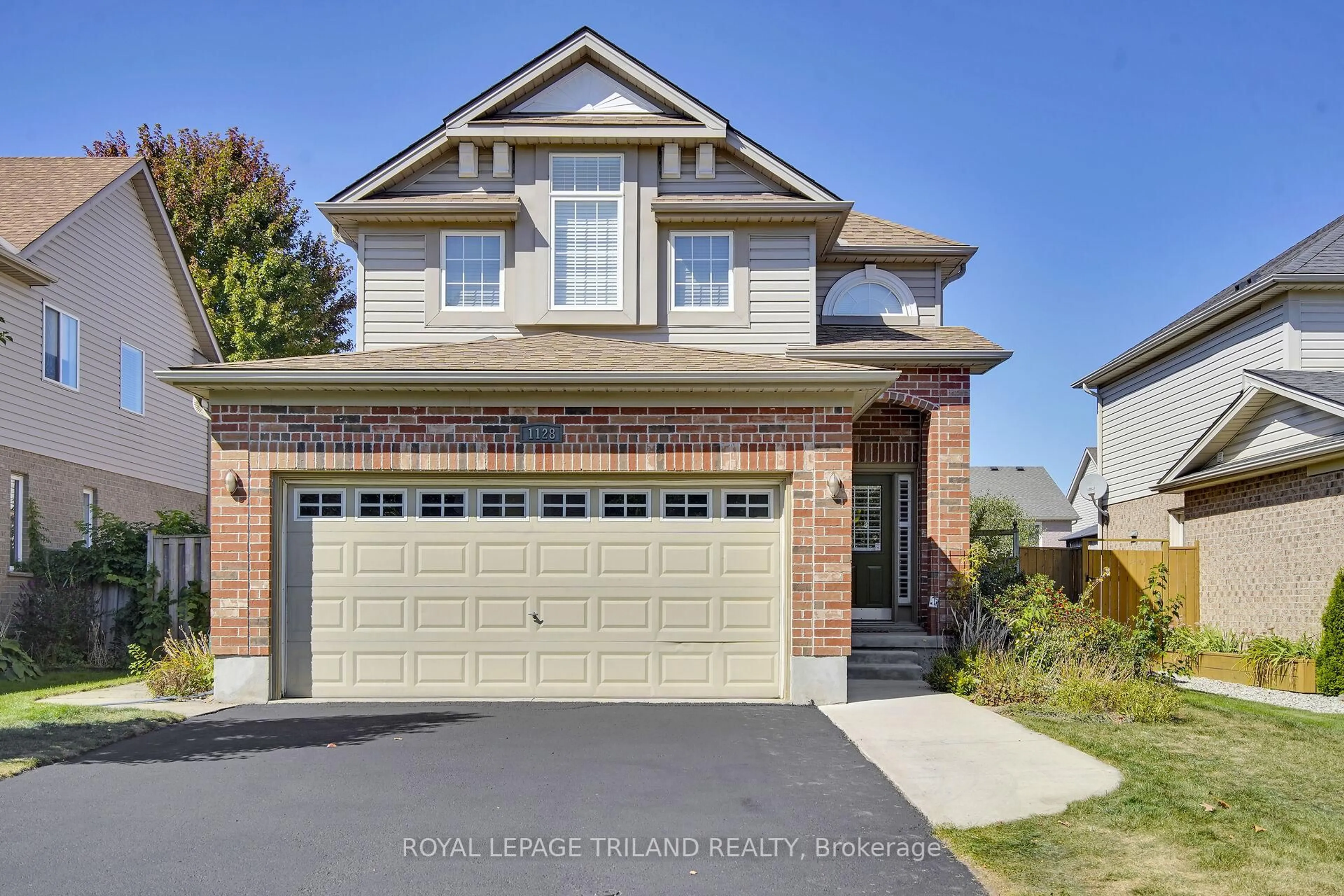Home with brick exterior material, street for 1128 Staghorn Cres, London East Ontario N5Y 5R1