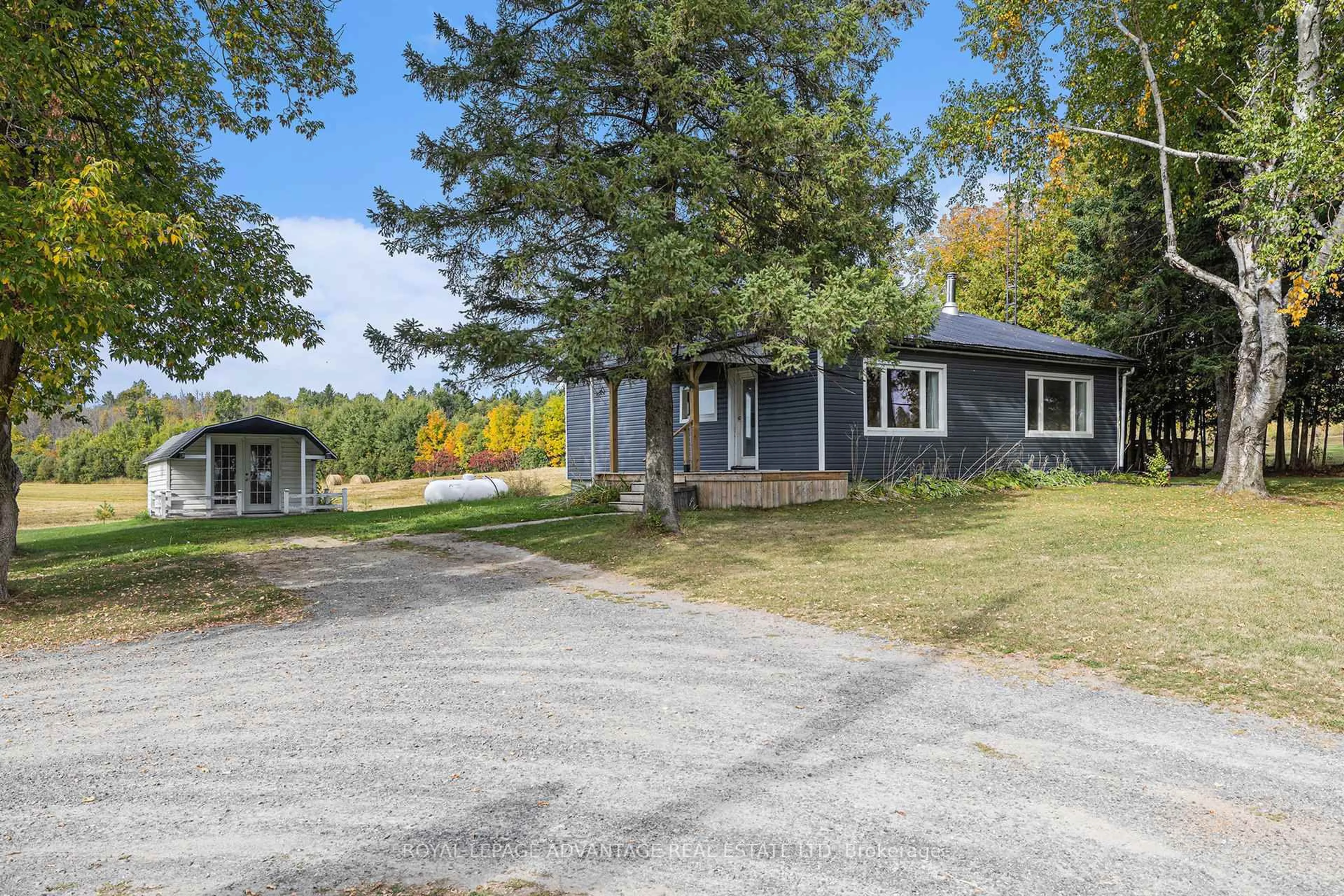 A pic from outside/outdoor area/front of a property/back of a property/a pic from drone, street for 19320 HIGHWAY 7 Rd, Perth Ontario K7H 3C9
