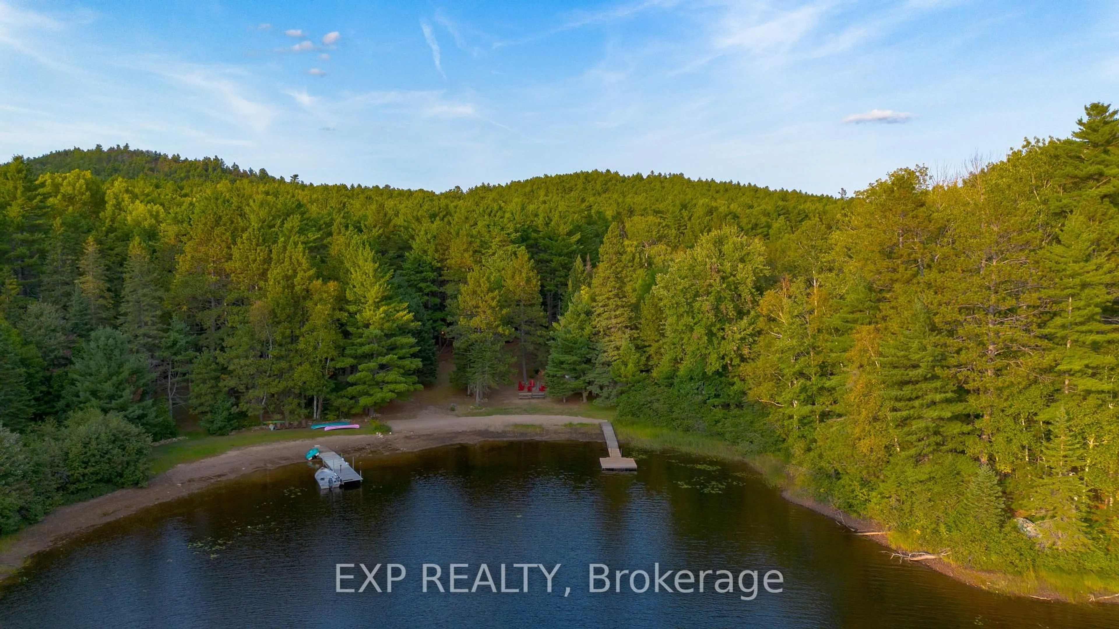 A pic from outside/outdoor area/front of a property/back of a property/a pic from drone, water/lake/river/ocean view for 1301 Dombroskie Rd, Barry's Bay Ontario K0J 1B0