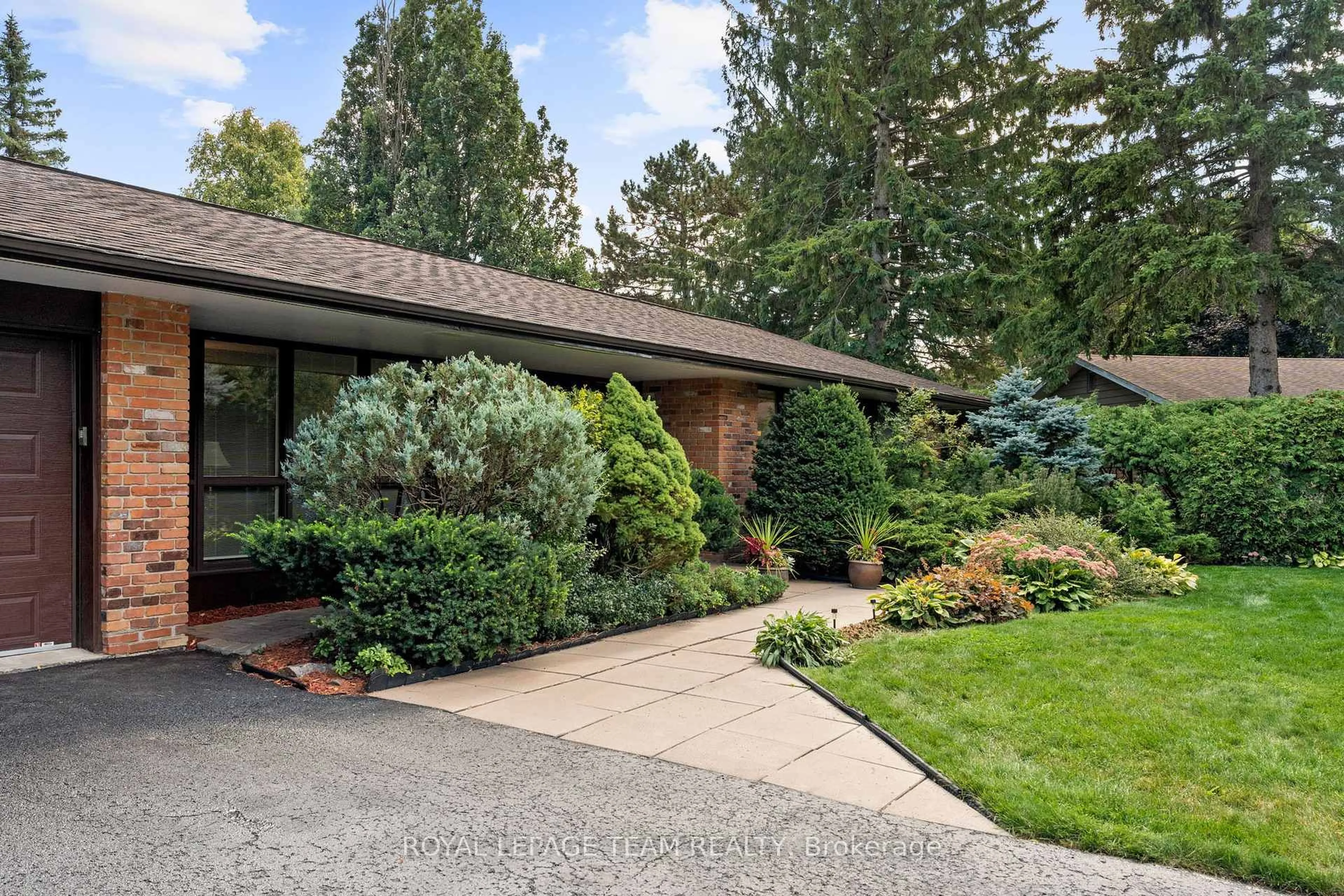 Home with brick exterior material, street for 22 Pellan Cres, Ottawa Ontario K2K 1J5