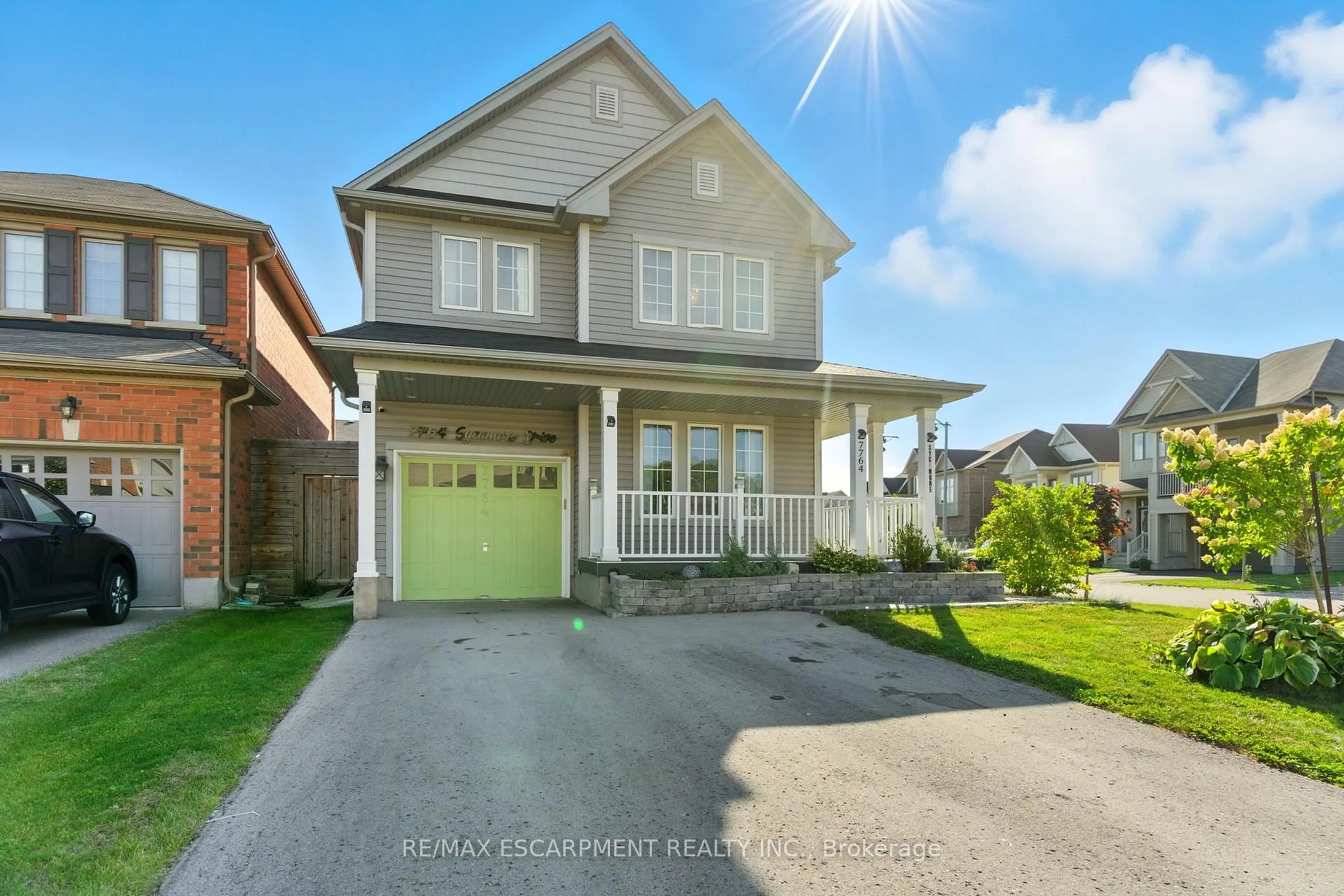 Home with vinyl exterior material, street for 7764 Sycamore Dr, Niagara Falls Ontario L2H 0N6