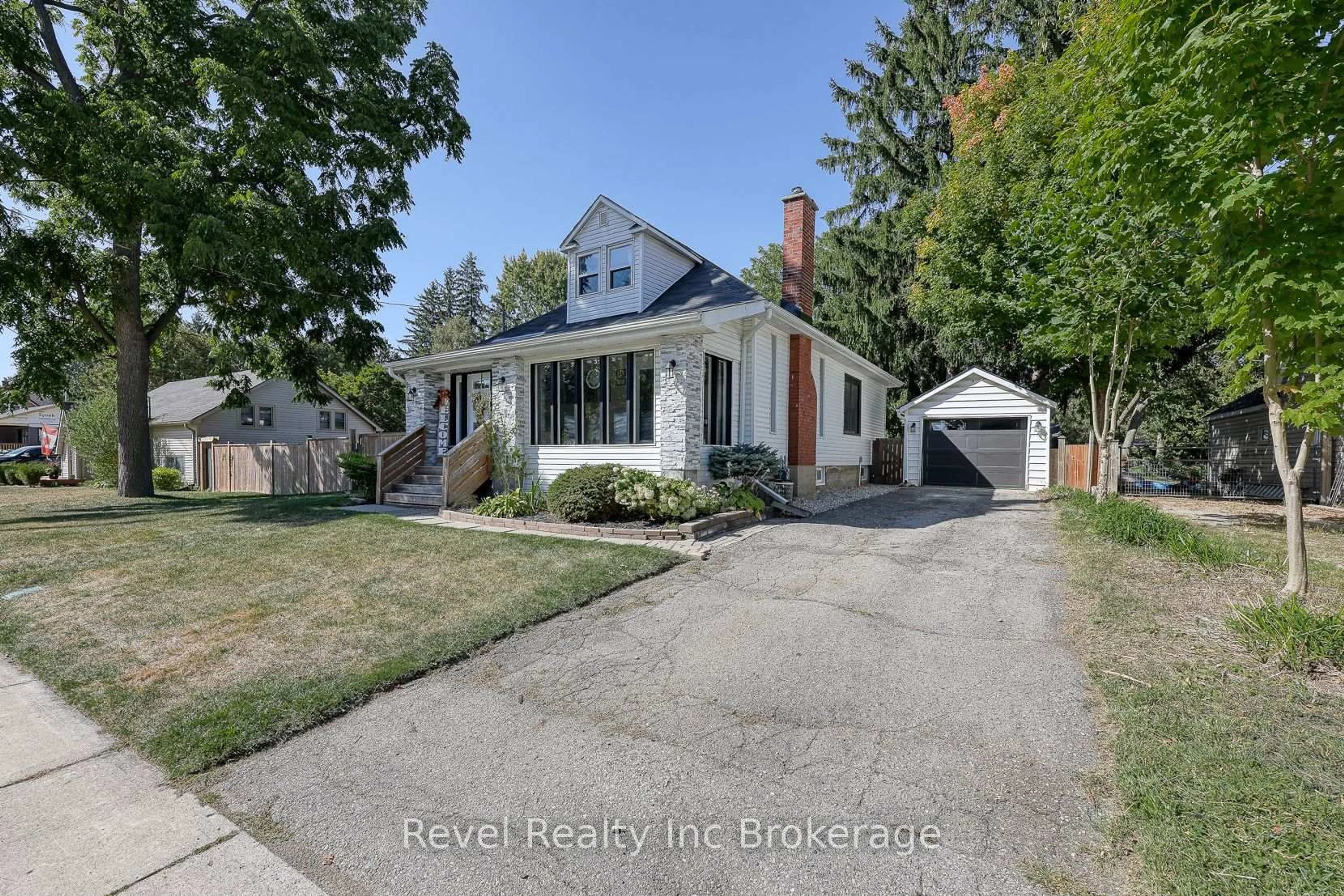 A pic from outside/outdoor area/front of a property/back of a property/a pic from drone, street for 174 Delatre St, Zorra Ontario N0M 2M0