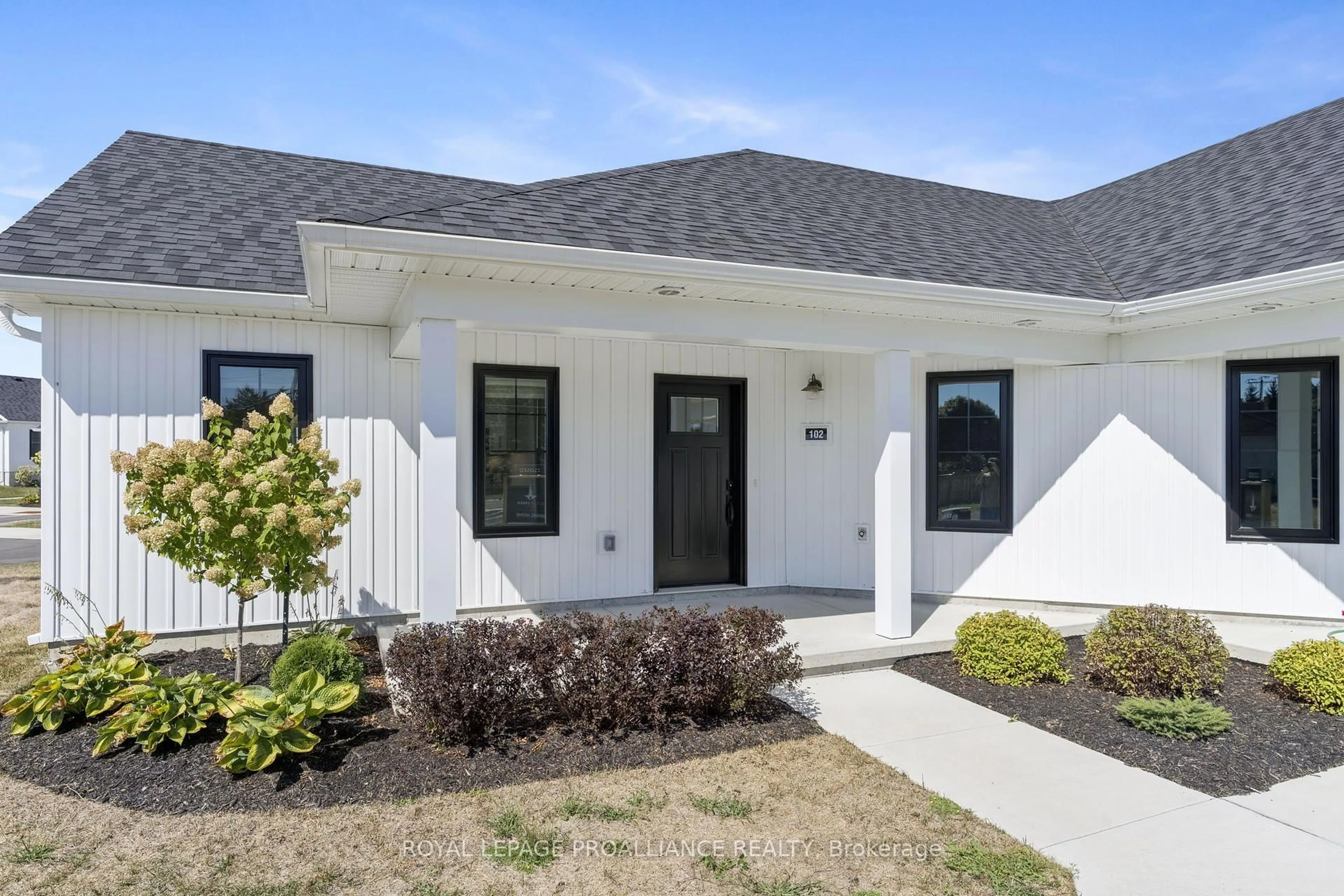 Home with vinyl exterior material, street for 14 Meadowcreek Dr #102, Brighton Ontario K0K 1H0