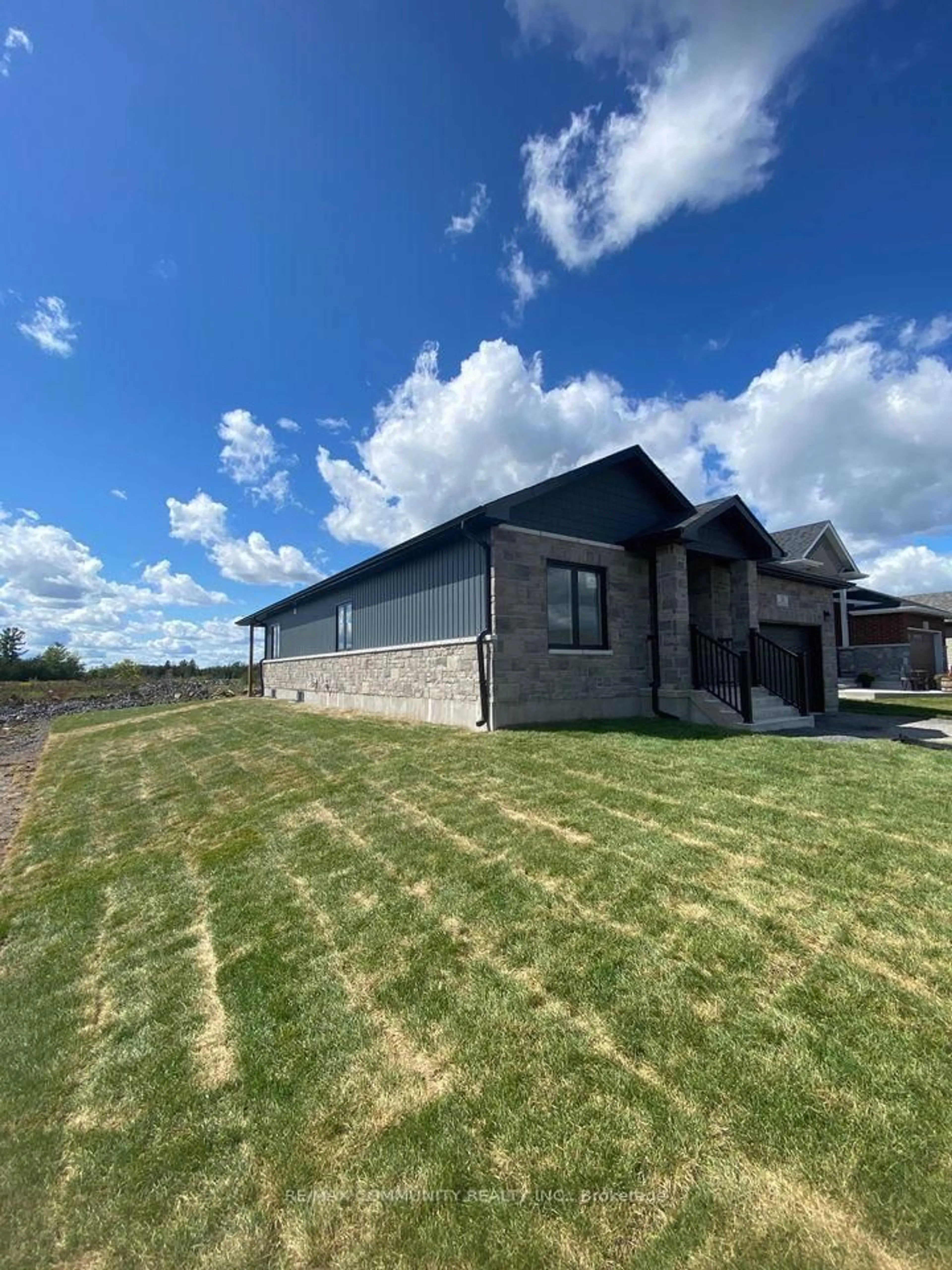 A pic from outside/outdoor area/front of a property/back of a property/a pic from drone, building for 52 Potter Dr, Bissett Creek Ontario K0H 2H0
