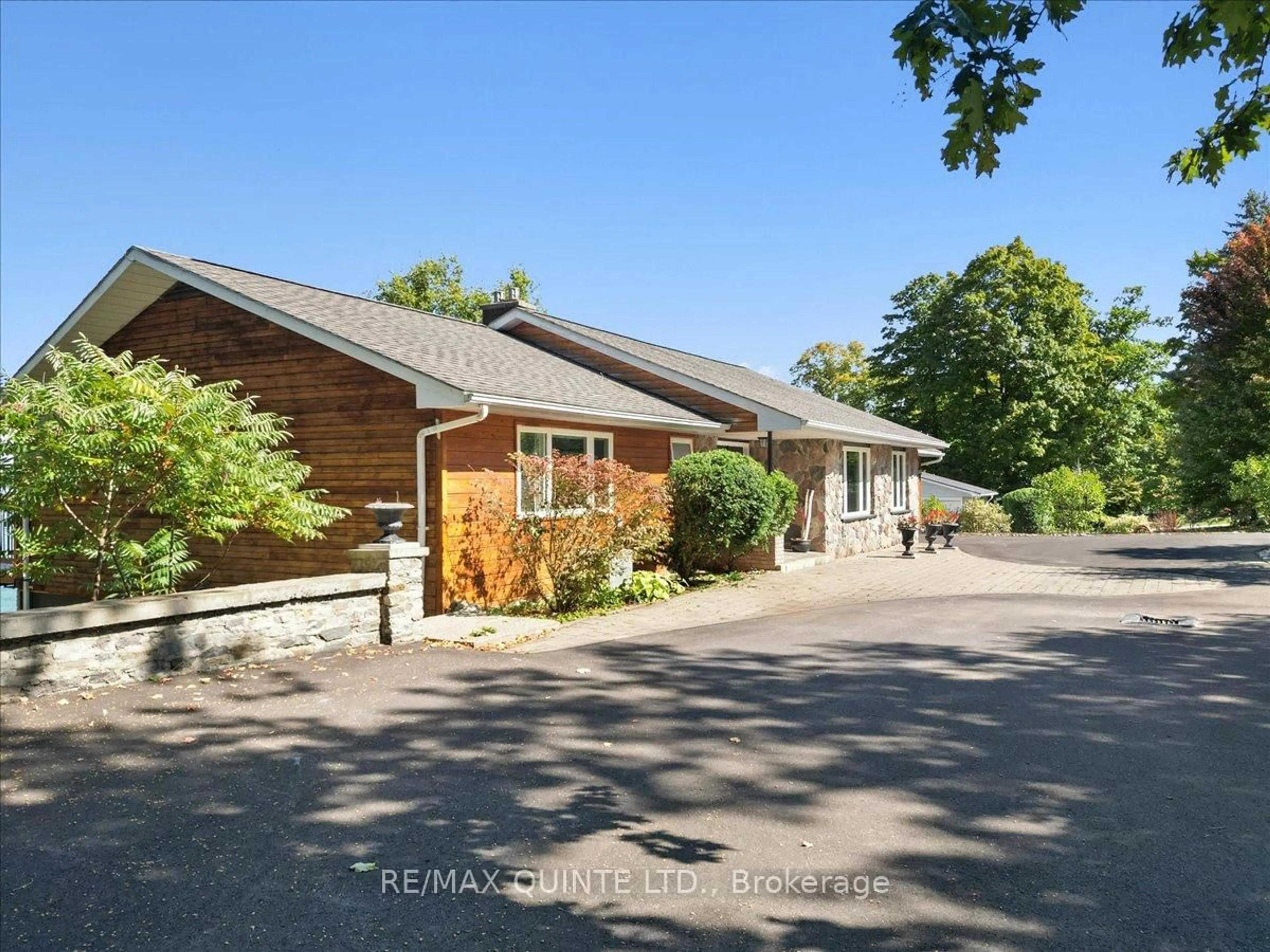 A pic from outside/outdoor area/front of a property/back of a property/a pic from drone, unknown for 11536 Loyalist Pkwy, Prince Edward County Ontario K0K 2T0
