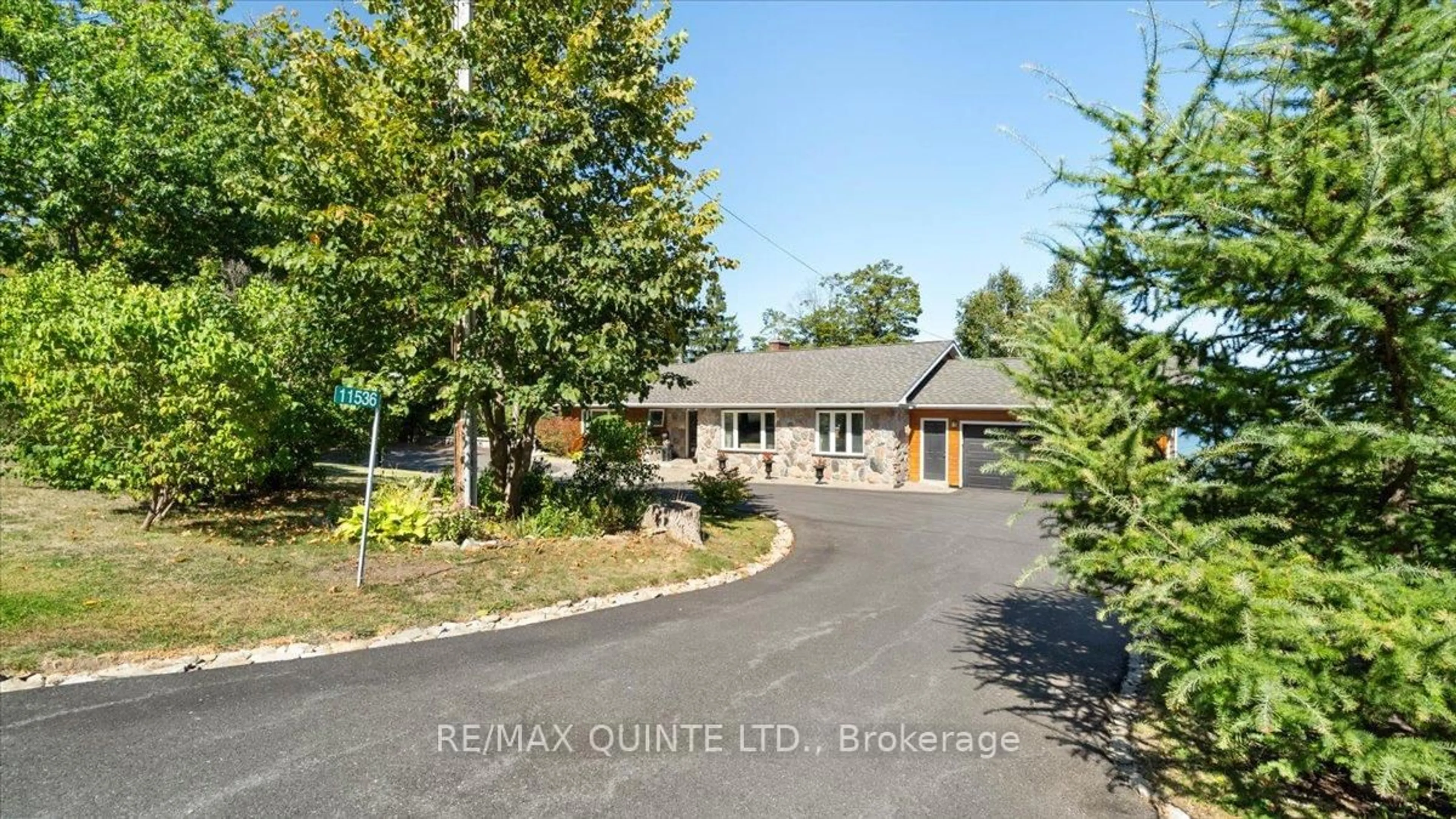 A pic from outside/outdoor area/front of a property/back of a property/a pic from drone, unknown for 11536 Loyalist Pkwy, Prince Edward County Ontario K0K 2T0