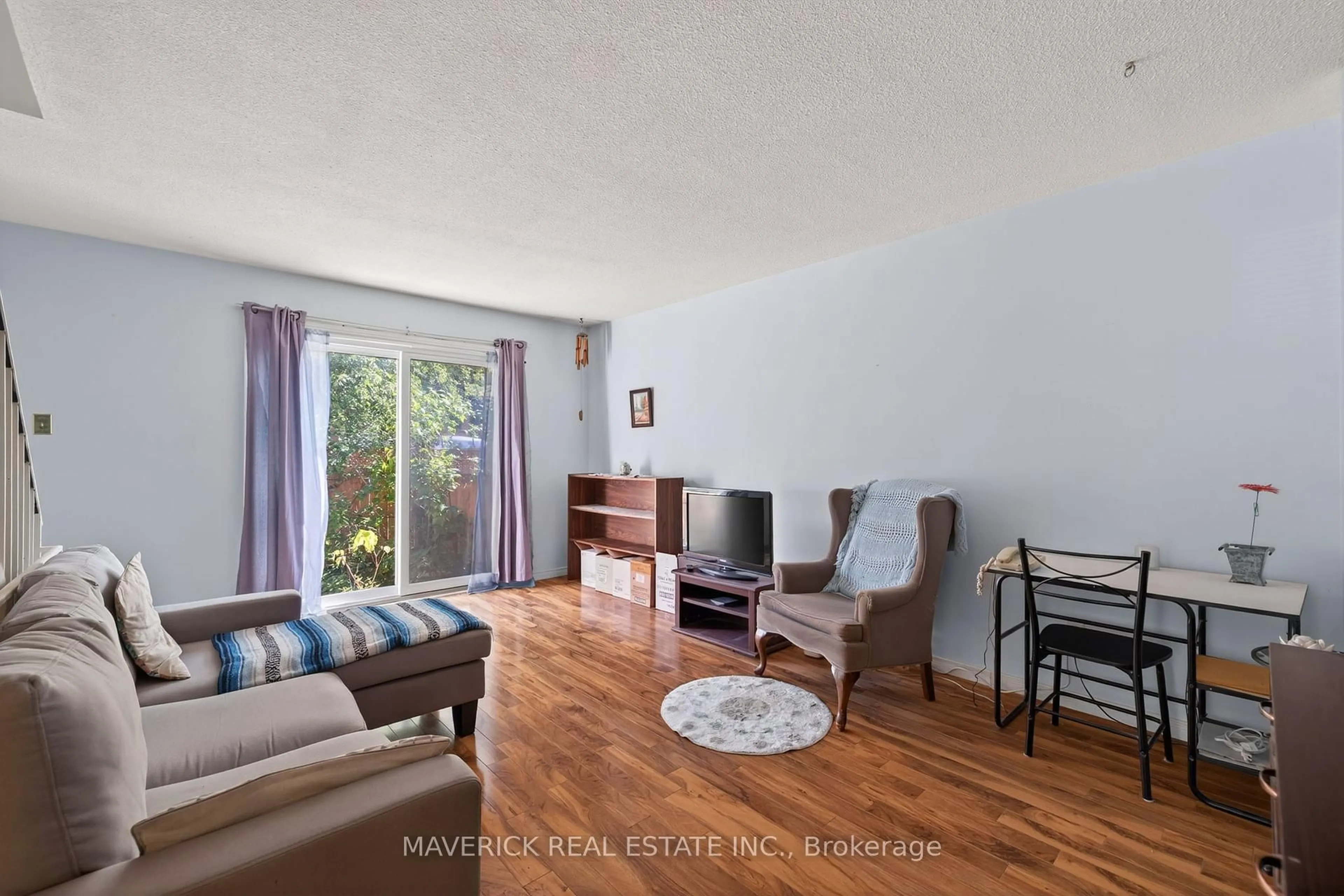 Living room with furniture, unknown for 135 Andover Dr #35, London South Ontario N6J 4C2