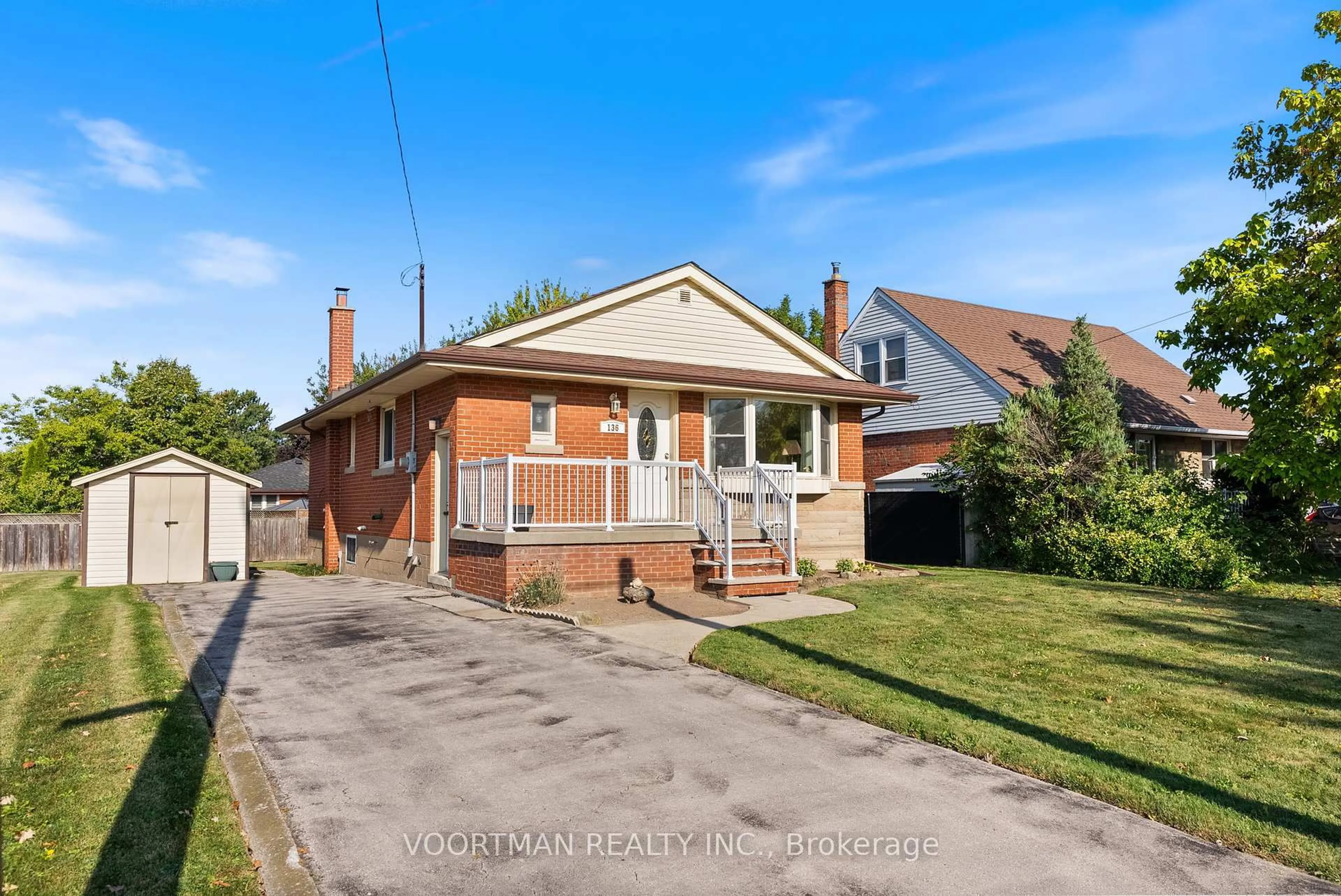 Home with brick exterior material, street for 136 Warren Ave, Hamilton Ontario L9A 3E1
