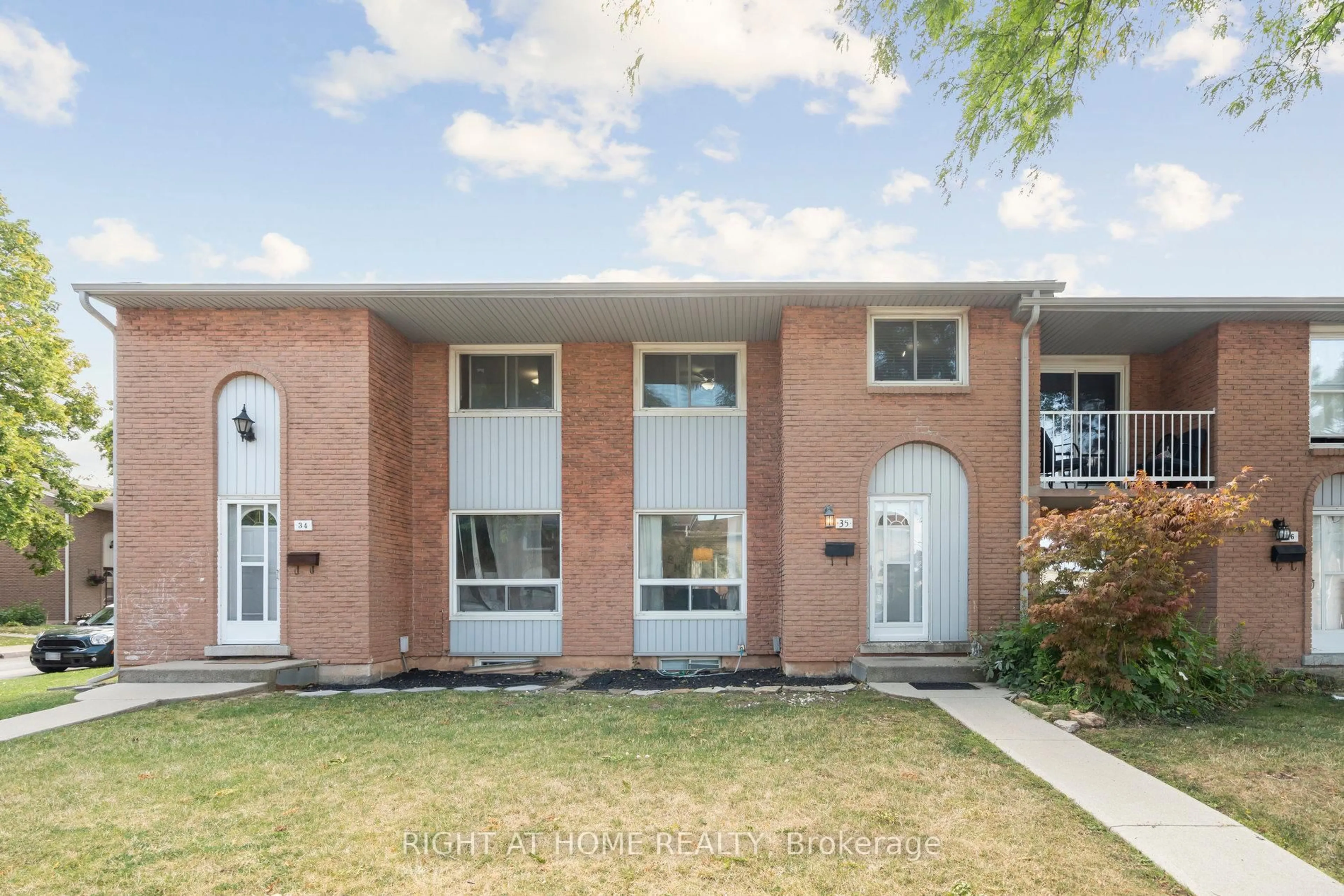 Home with brick exterior material, street for 151 Gateshead Cres #35, Hamilton Ontario L8G 3W1