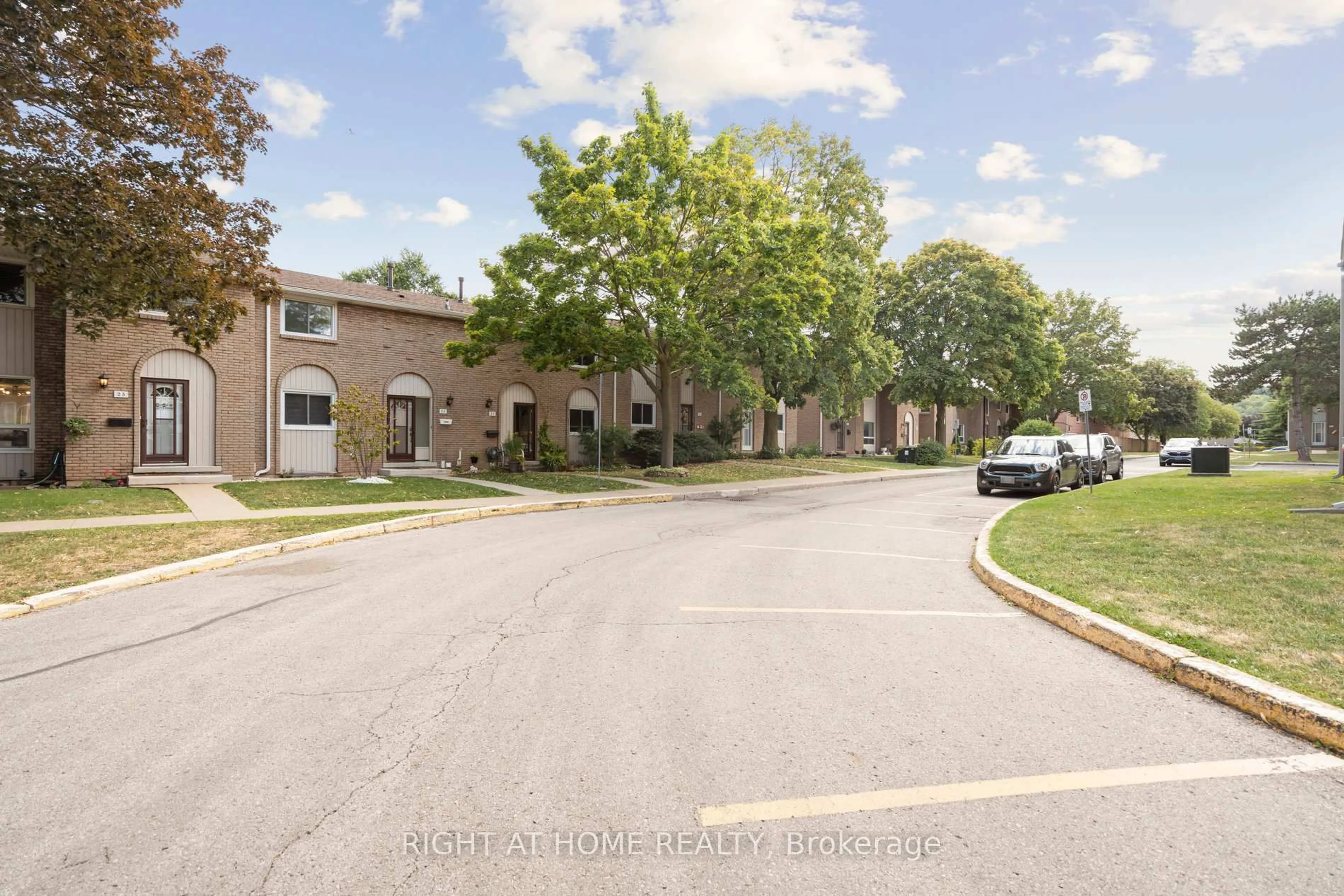 A pic from outside/outdoor area/front of a property/back of a property/a pic from drone, street for 151 Gateshead Cres #35, Hamilton Ontario L8G 3W1