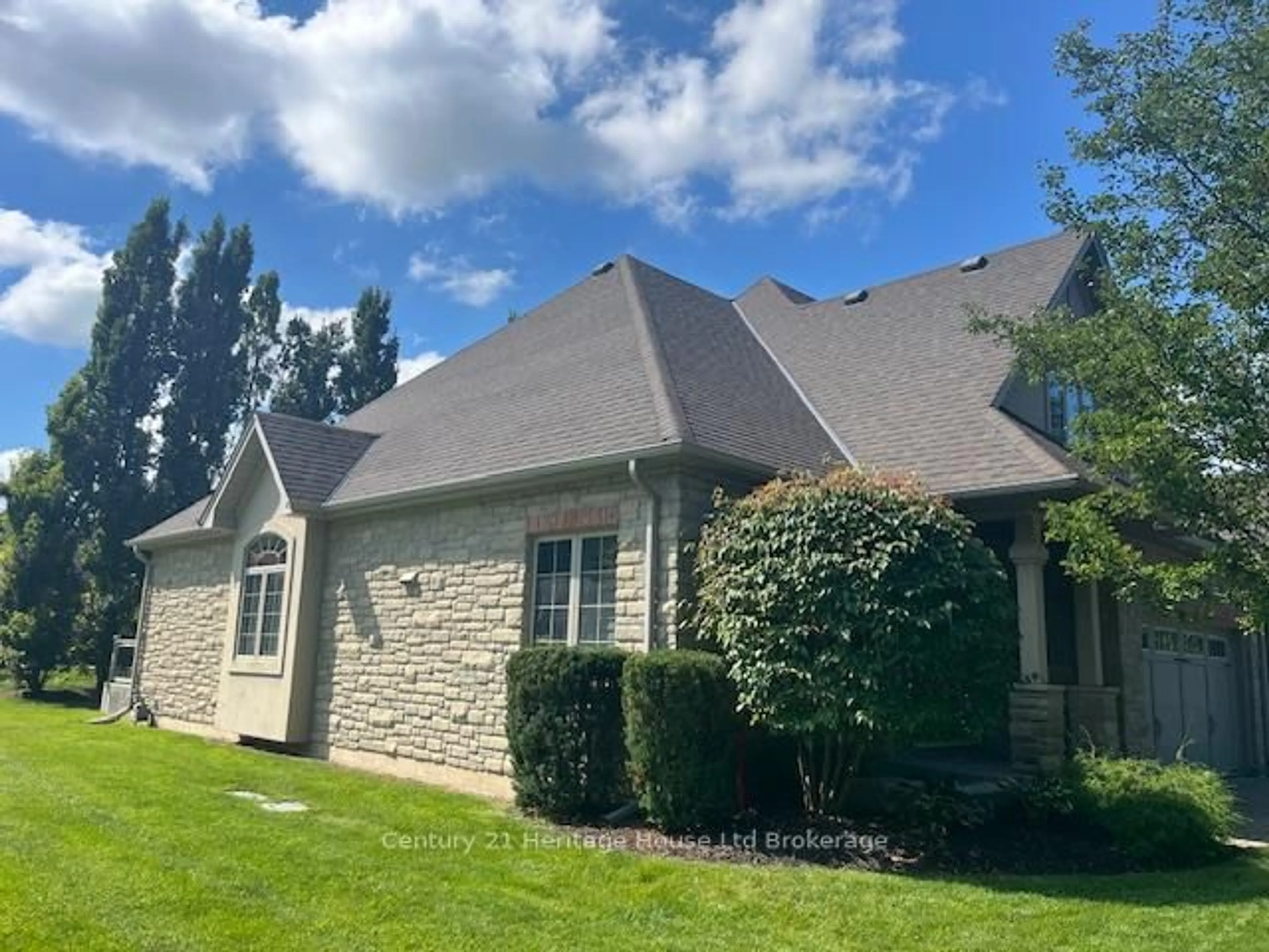 Home with brick exterior material, unknown for 5 Woodhaven Dr #1, Tillsonburg Ontario N4G 0A8