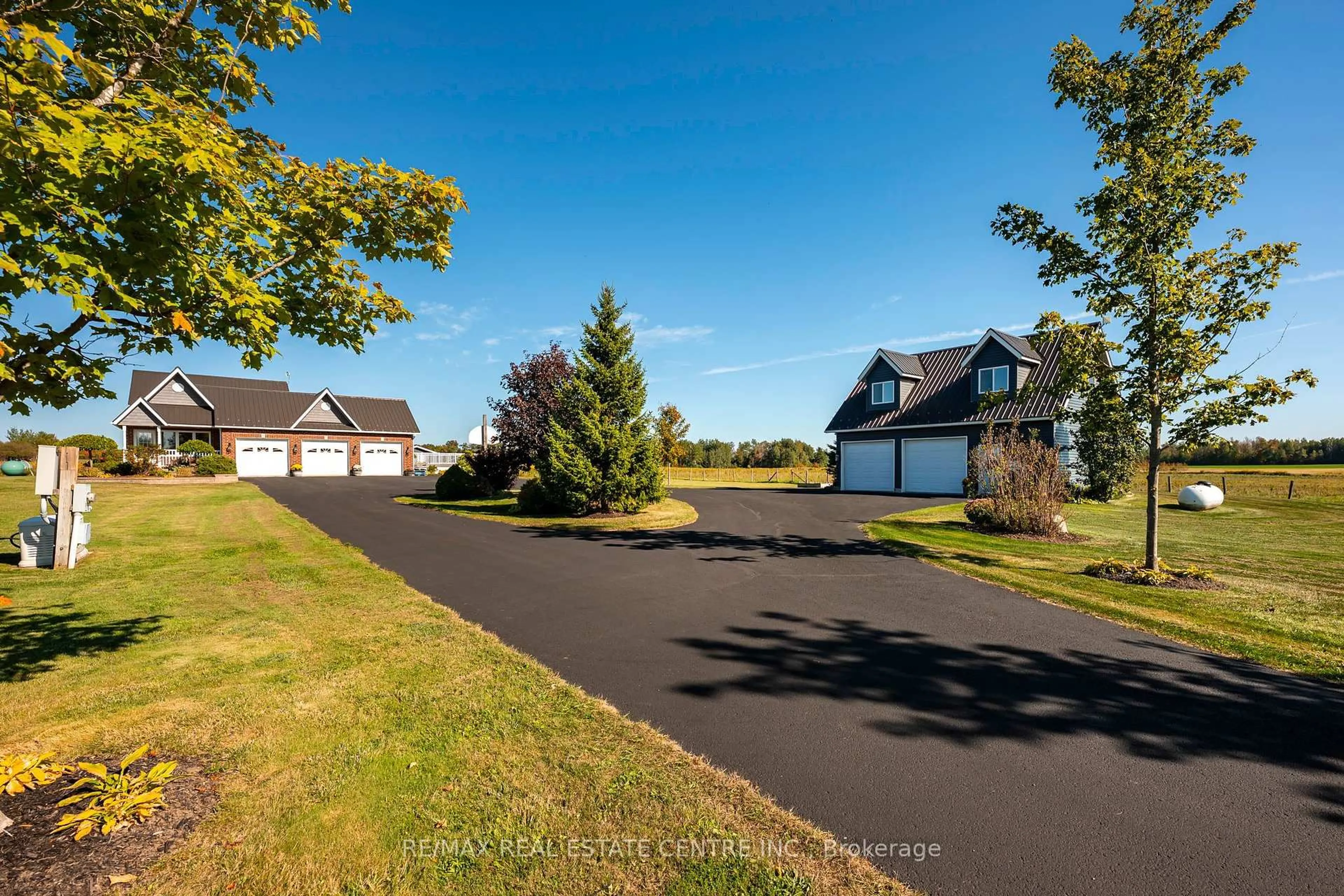 A pic from outside/outdoor area/front of a property/back of a property/a pic from drone, street for 395115 County Road 12 Rd, Amaranth Ontario L9W 0N4