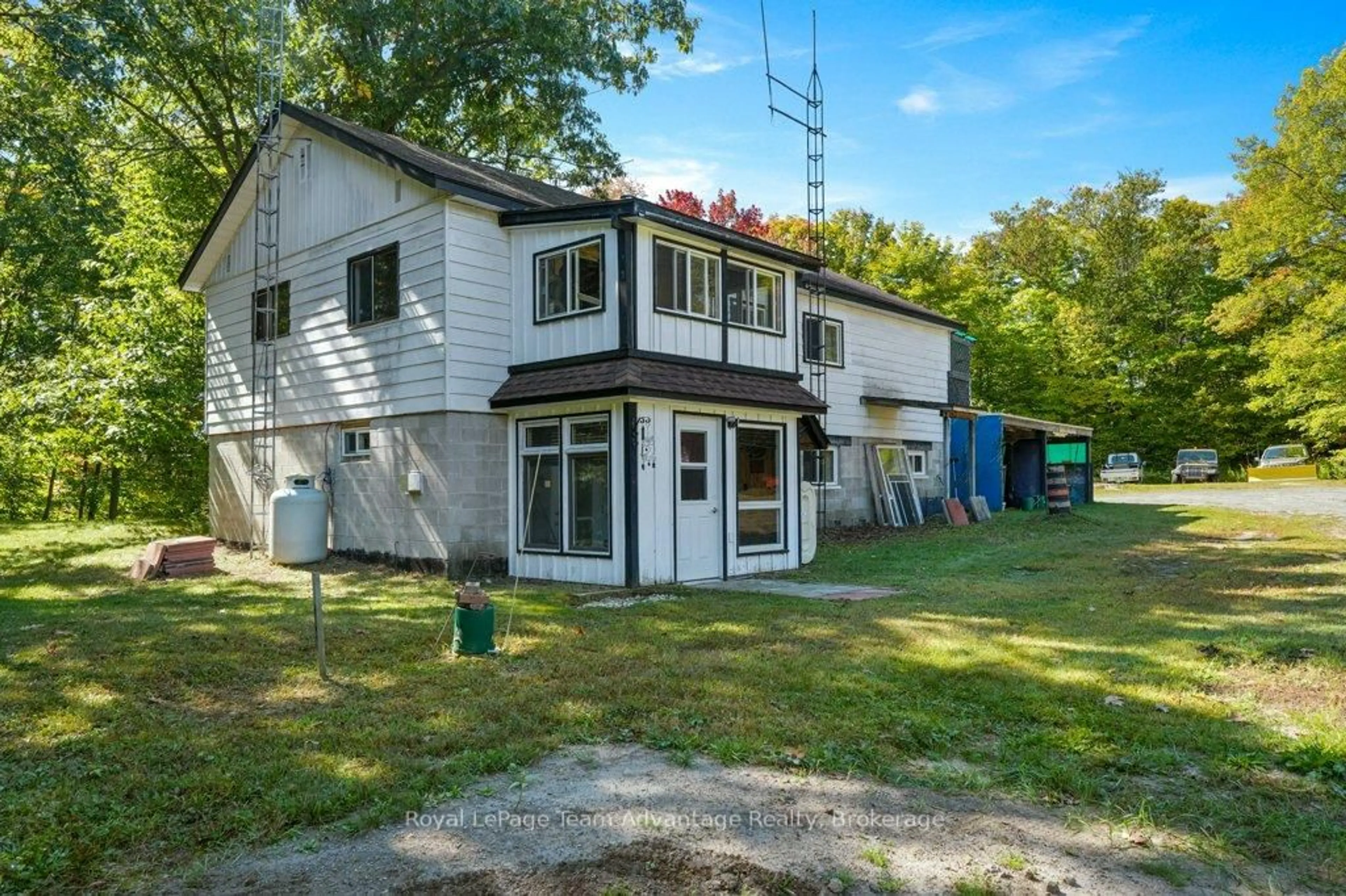 A pic from outside/outdoor area/front of a property/back of a property/a pic from drone, water/lake/river/ocean view for 18 Horseshoe Lake Rd, Seguin Ontario P2A 2W8