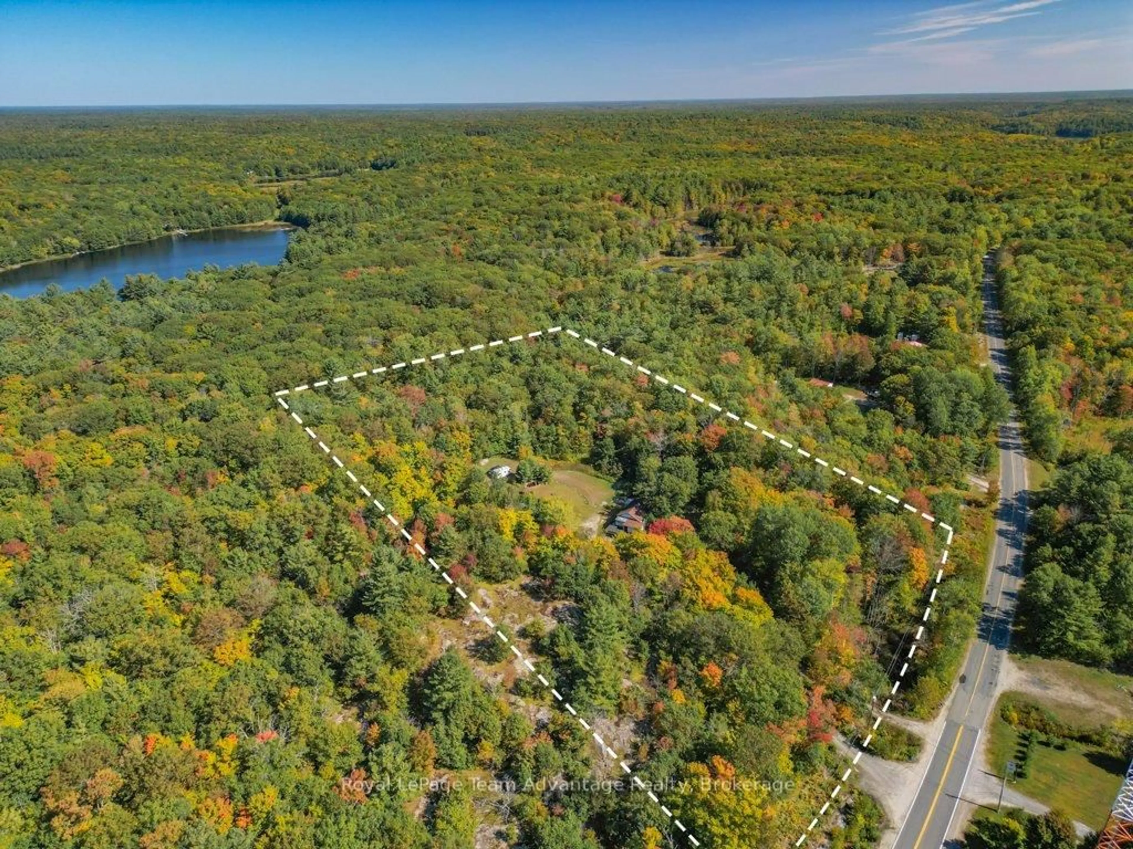 A pic from outside/outdoor area/front of a property/back of a property/a pic from drone, forest/trees view for 18 Horseshoe Lake Rd, Seguin Ontario P2A 2W8