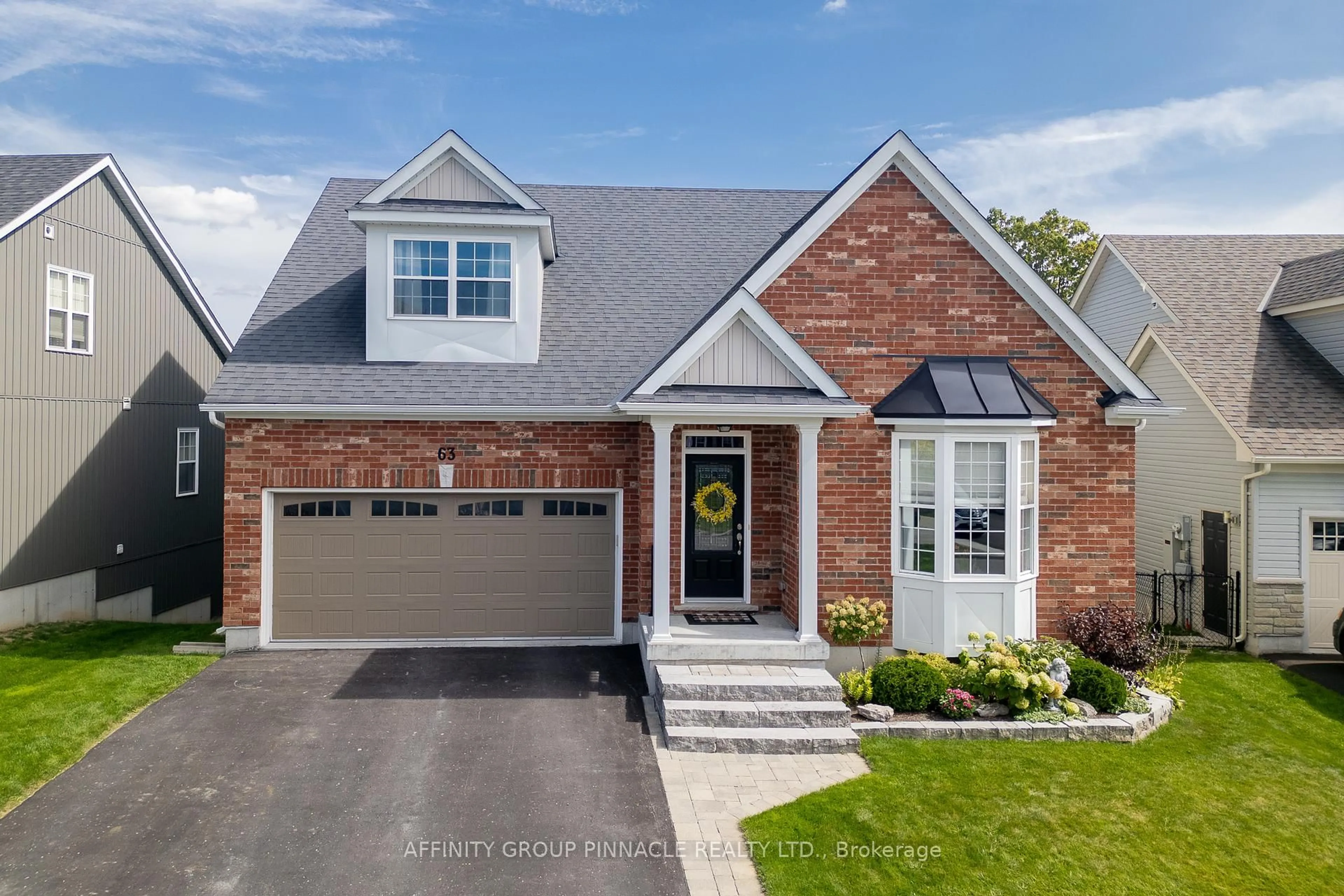 Home with brick exterior material, street for 63 Broad St, Kawartha Lakes Ontario K9V 0L9