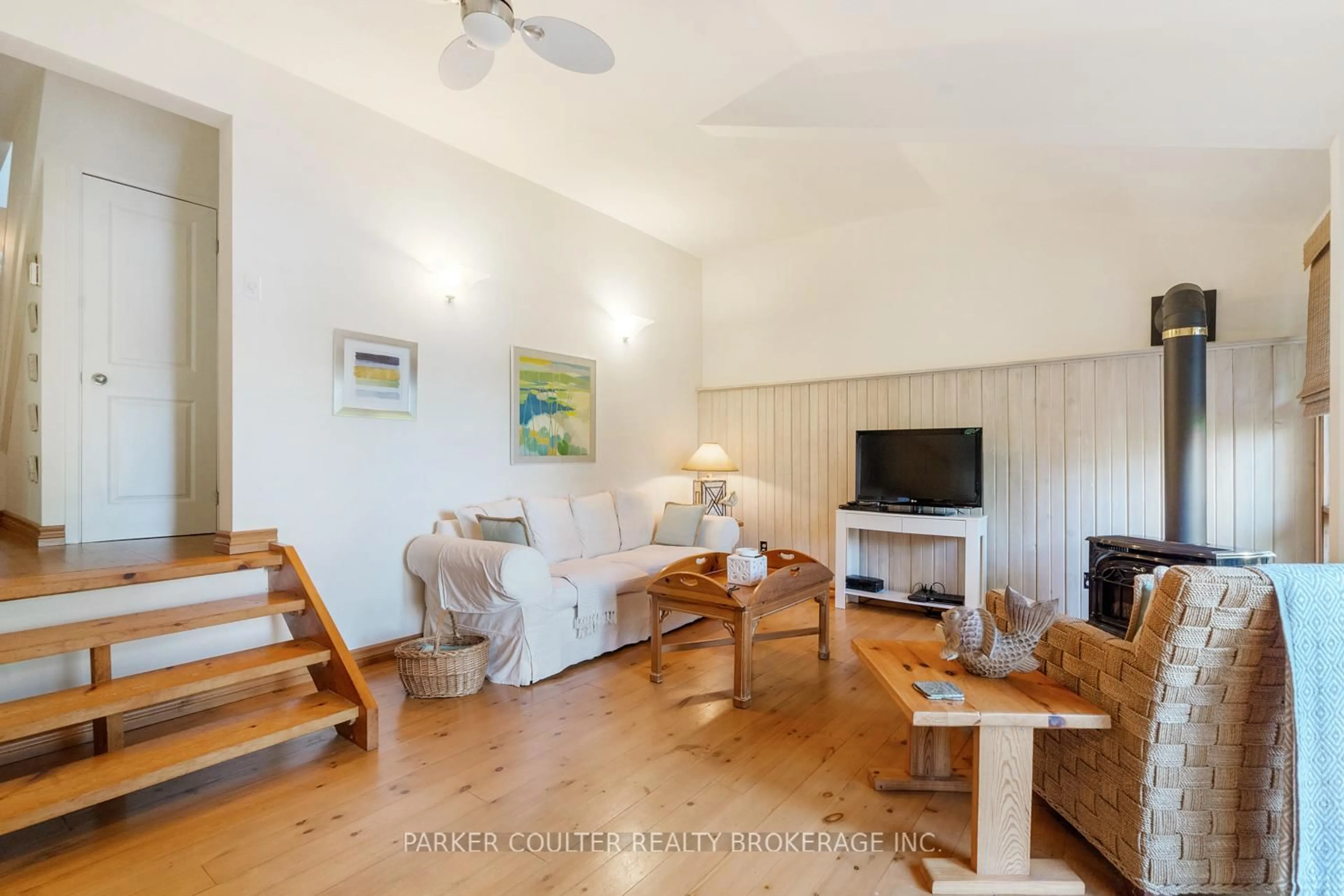 Living room with furniture, wood/laminate floor for 199 Sugar Lake Rd #A, Seguin Ontario P2A 2W9