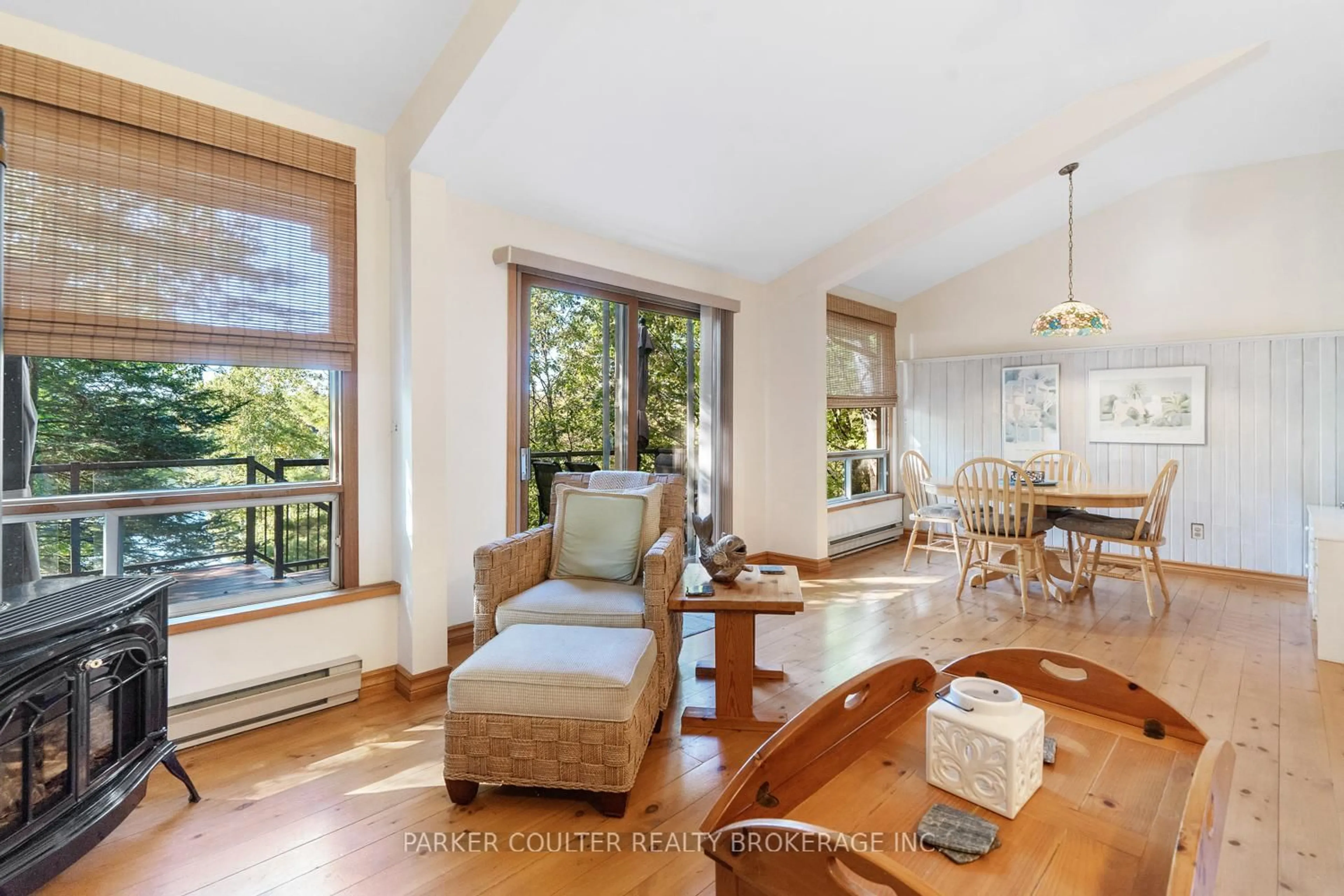 Living room with furniture, wood/laminate floor for 199 Sugar Lake Rd #A, Seguin Ontario P2A 2W9