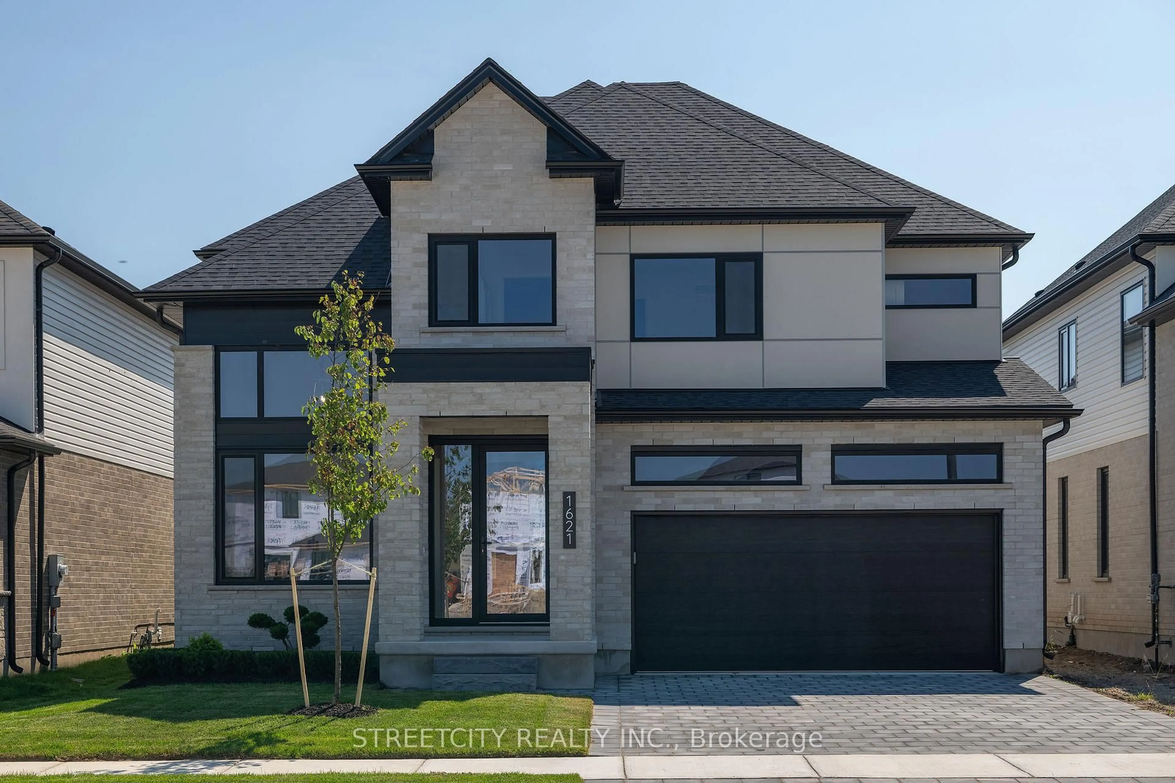 Home with brick exterior material, street for 1621 Medway Park Dr, London North Ontario N6G 5B6