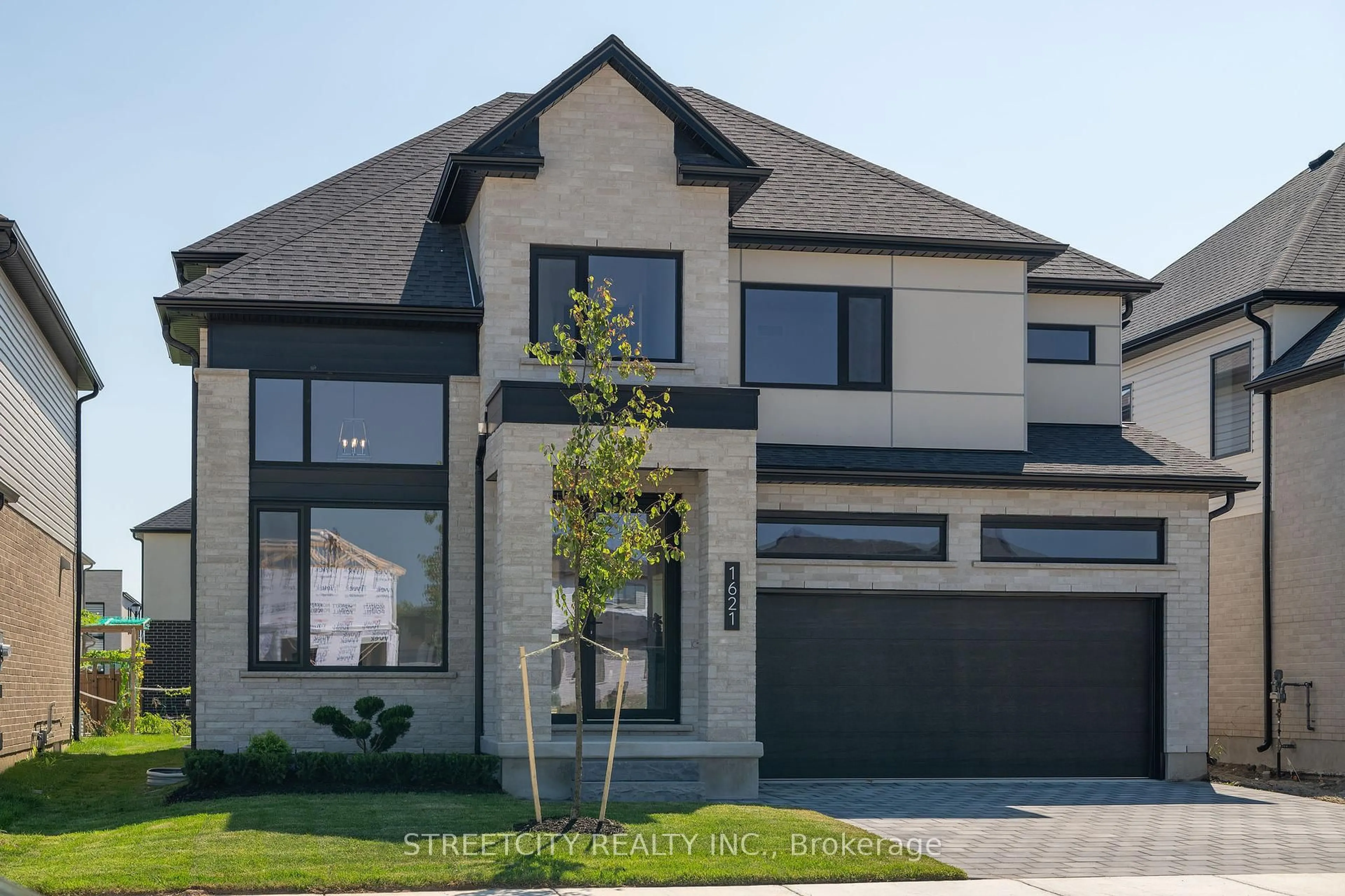 Home with brick exterior material, street for 1621 Medway Park Dr, London North Ontario N6G 5B6