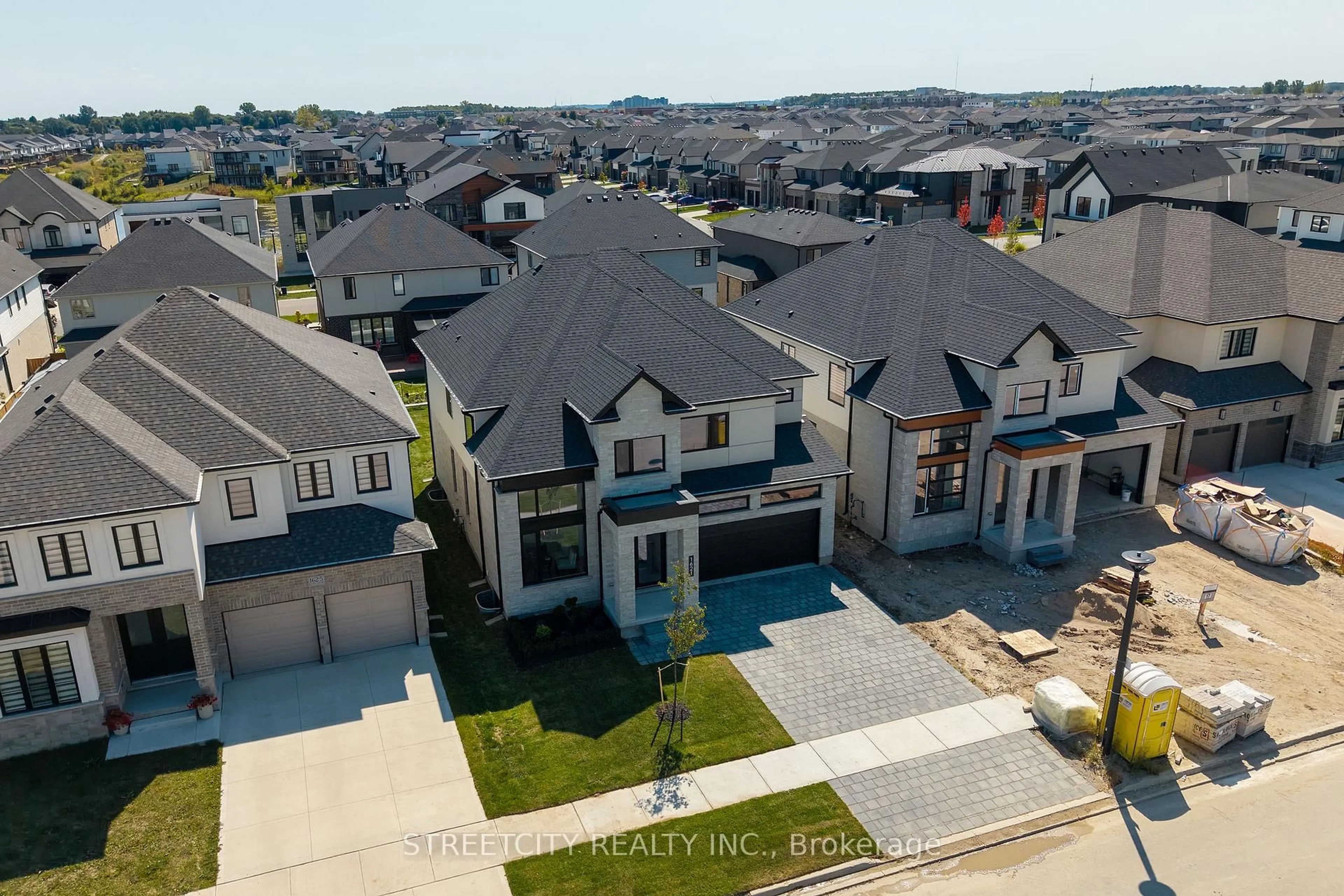 A pic from outside/outdoor area/front of a property/back of a property/a pic from drone, street for 1621 Medway Park Dr, London North Ontario N6G 5B6
