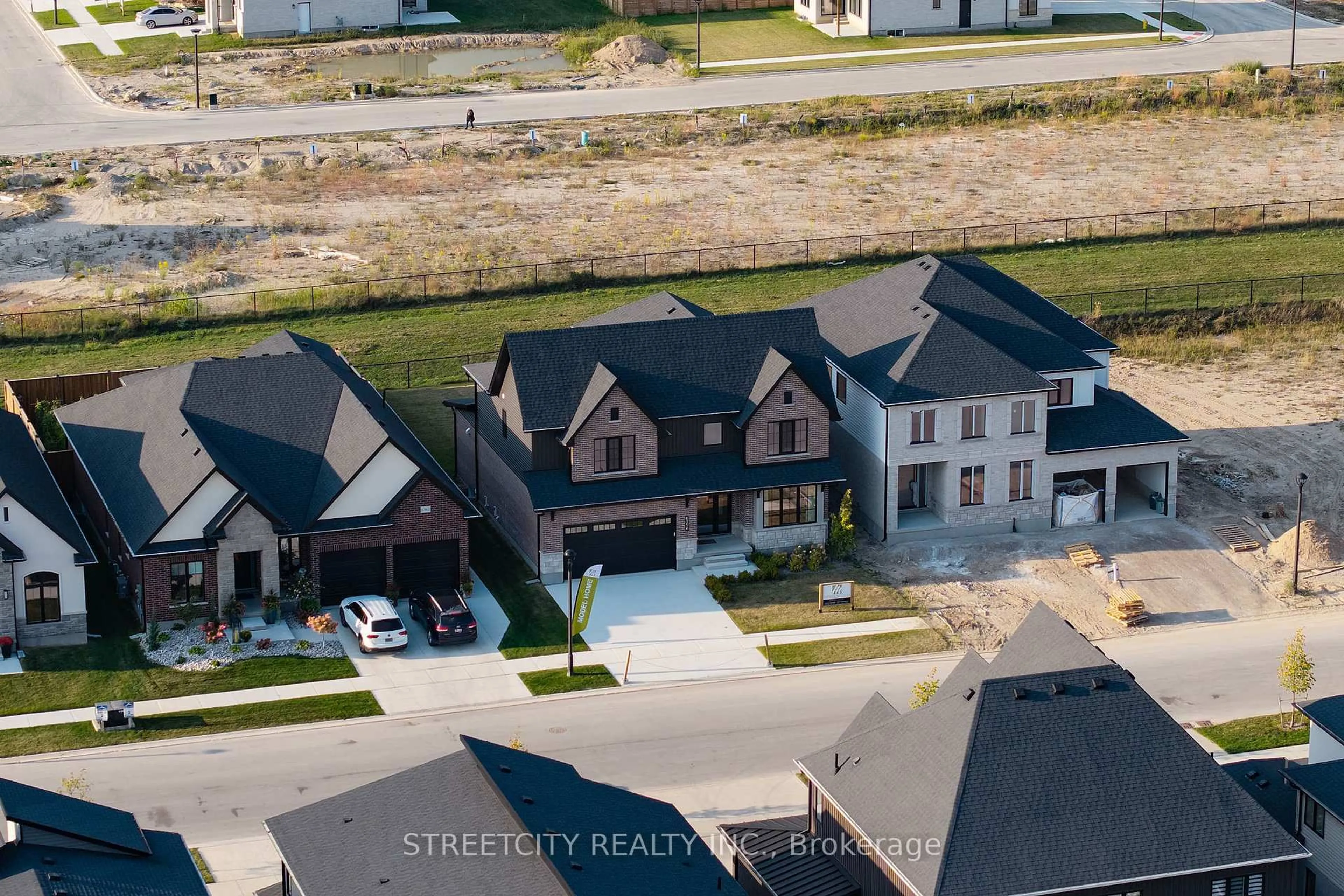 A pic from outside/outdoor area/front of a property/back of a property/a pic from drone, street for 6354 Old Garrison Blvd, London South Ontario N6P 0L4