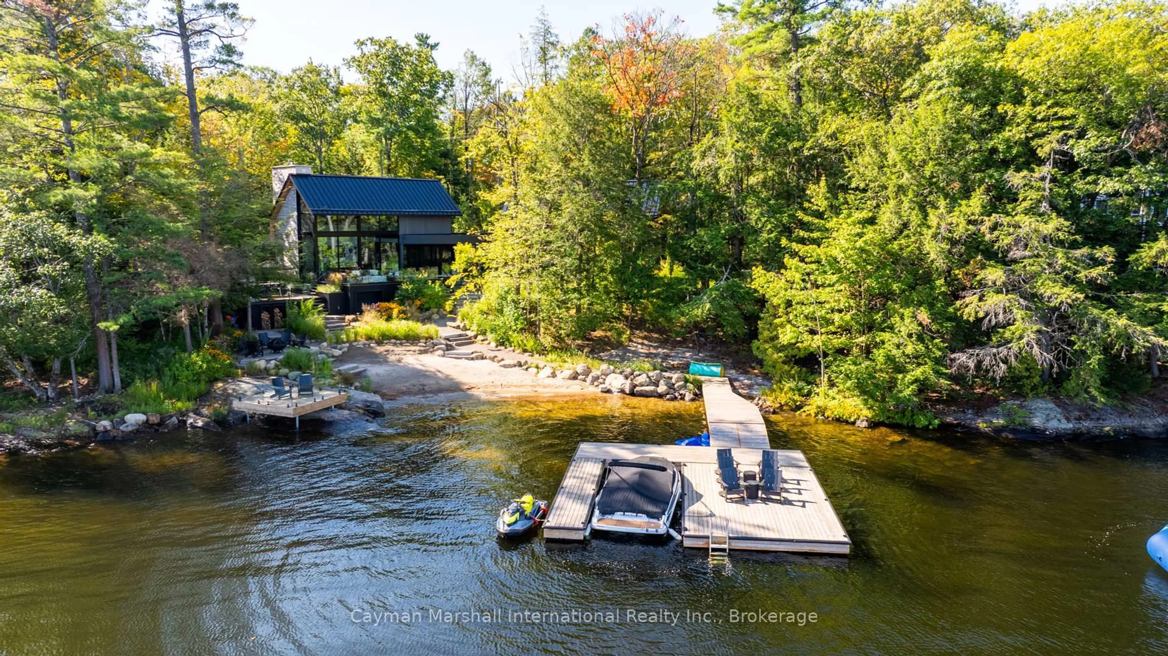 A pic from outside/outdoor area/front of a property/back of a property/a pic from drone, water/lake/river/ocean view for 1083 Hurling Point Rd, Muskoka Lakes Ontario P0C 1A0