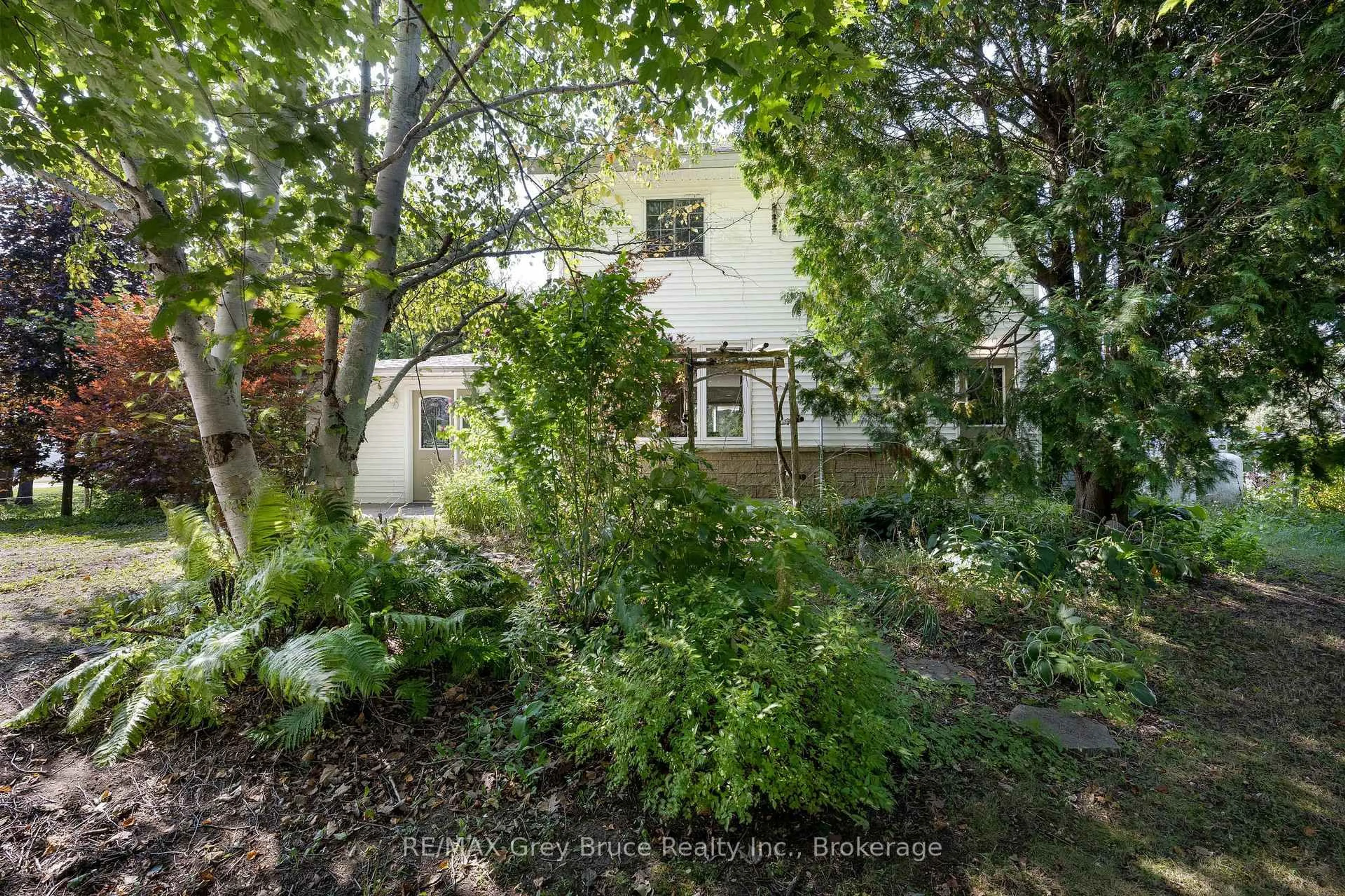 A pic from outside/outdoor area/front of a property/back of a property/a pic from drone, street for 7011 Highway 6, Northern Bruce Peninsula Ontario N0H 2R0