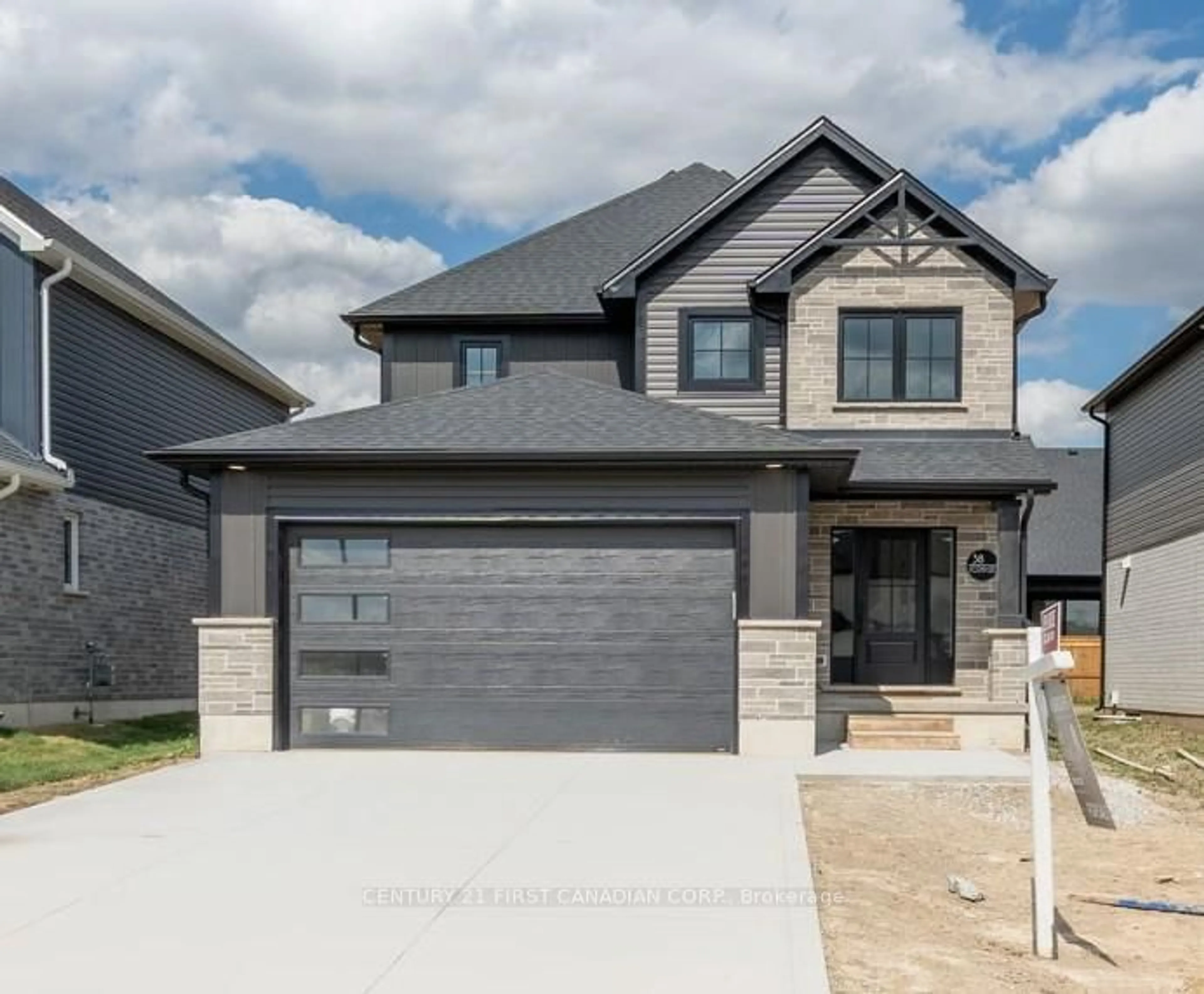 Home with brick exterior material, street for 38 Postma Cres, North Middlesex Ontario N0M 1A0