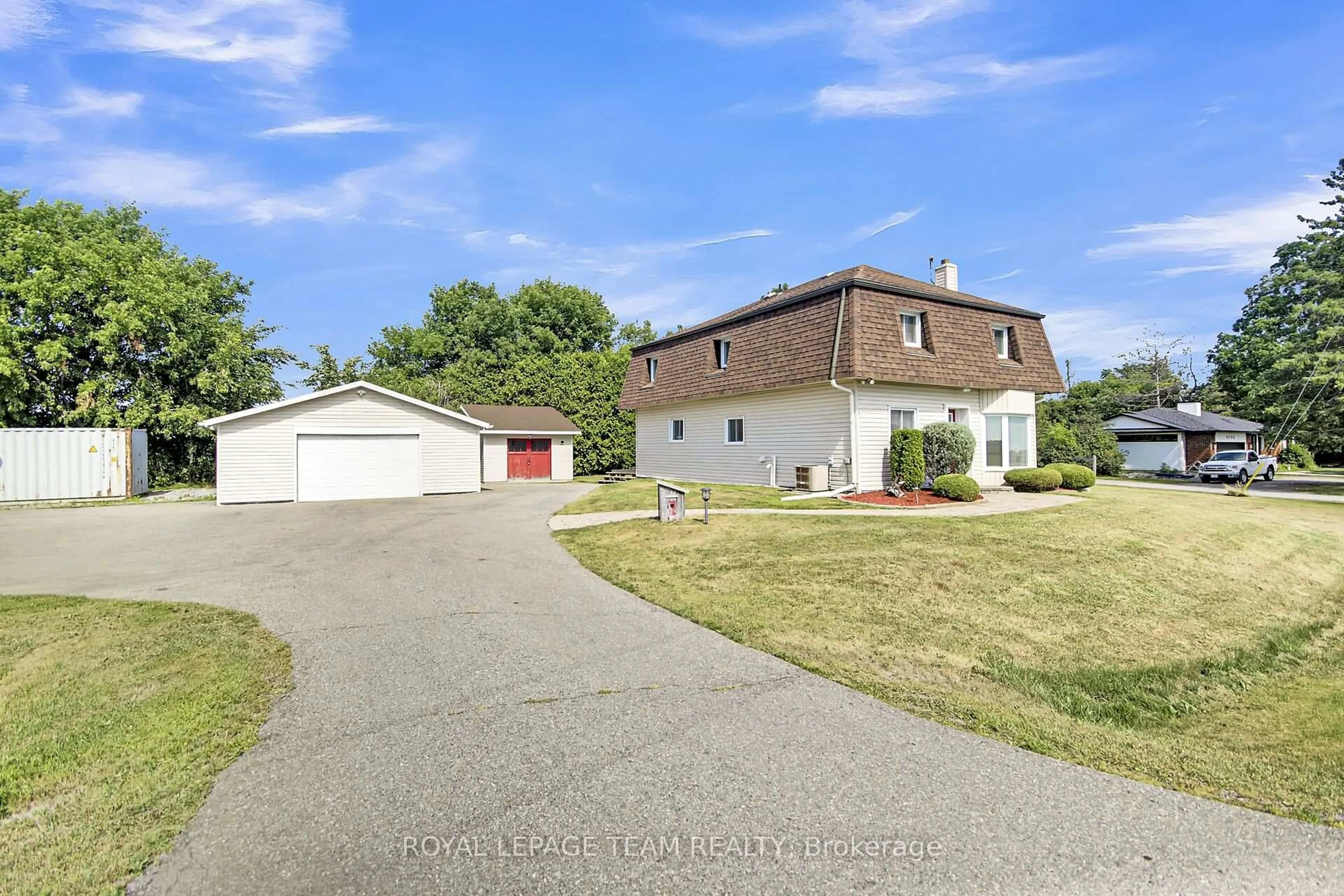A pic from outside/outdoor area/front of a property/back of a property/a pic from drone, street for 5745 Fourth Line Rd, North Gower Ontario K0A 2T0