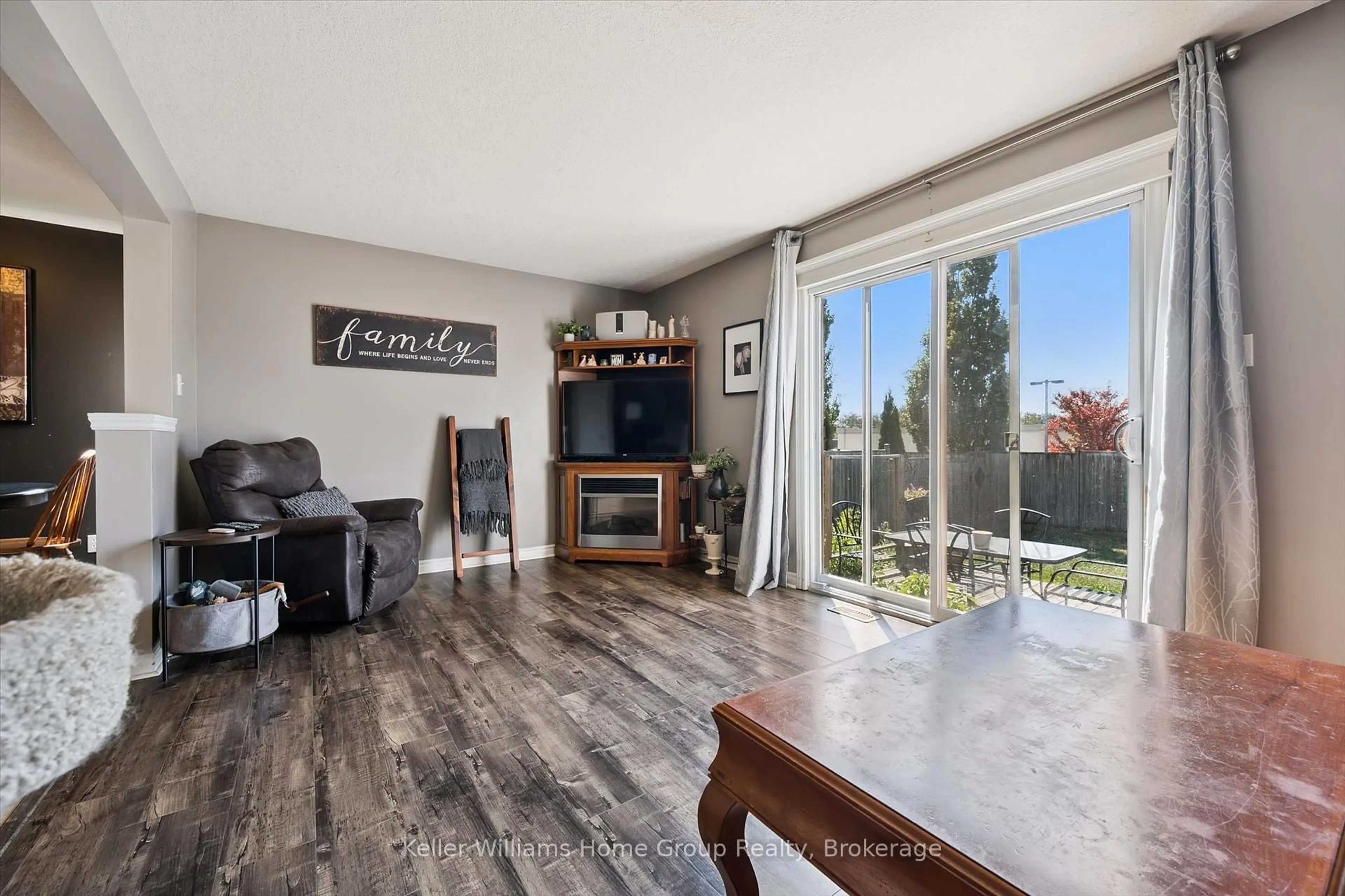Living room with furniture, wood/laminate floor for 276 Severn Dr, Guelph Ontario N1E 0E8