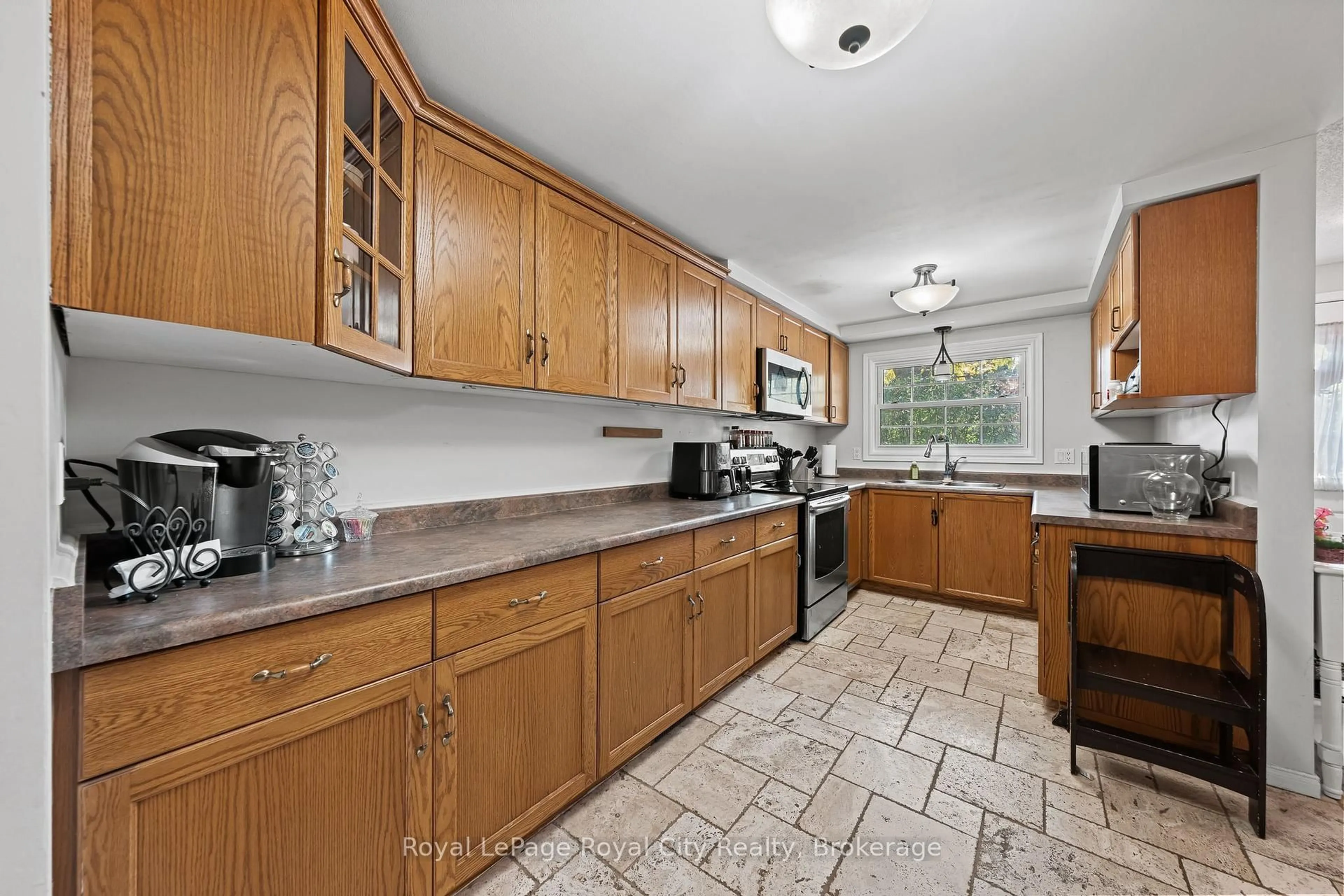 Standard kitchen, ceramic/tile floor for 129 Victoria Rd #16, Guelph Ontario N1E 6V3