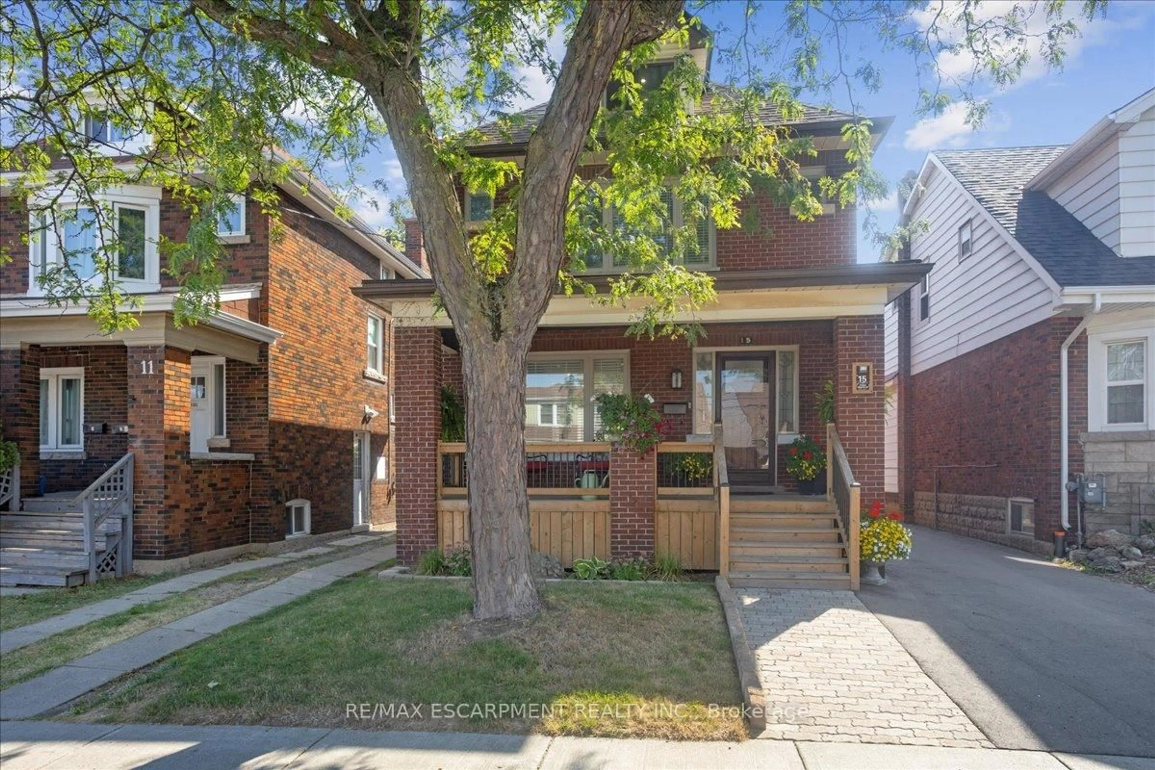 Home with brick exterior material, street for 15 Ottawa St, Hamilton Ontario L8K 2C9