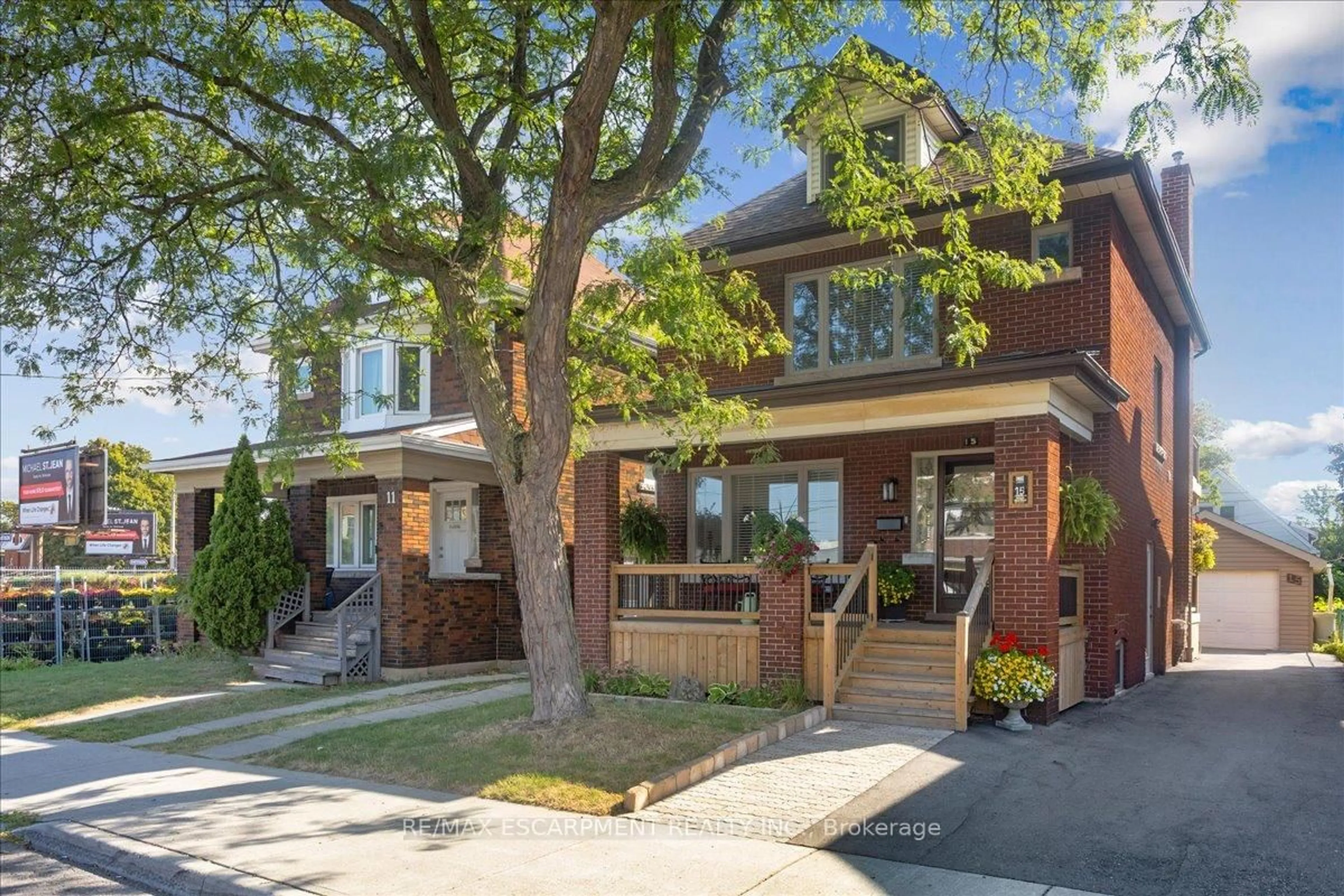 Home with brick exterior material, street for 15 Ottawa St, Hamilton Ontario L8K 2C9