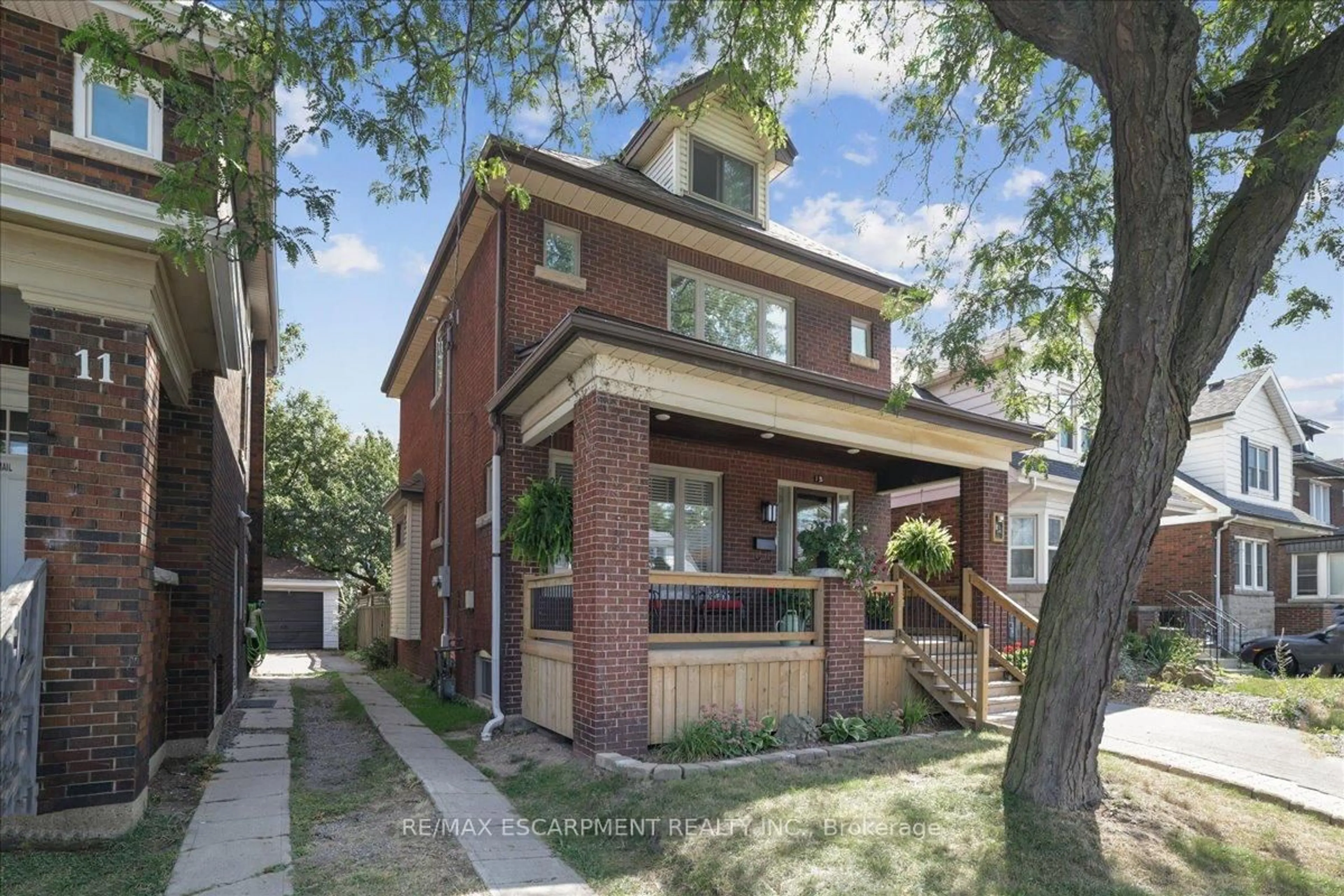 Home with brick exterior material, street for 15 Ottawa St, Hamilton Ontario L8K 2C9