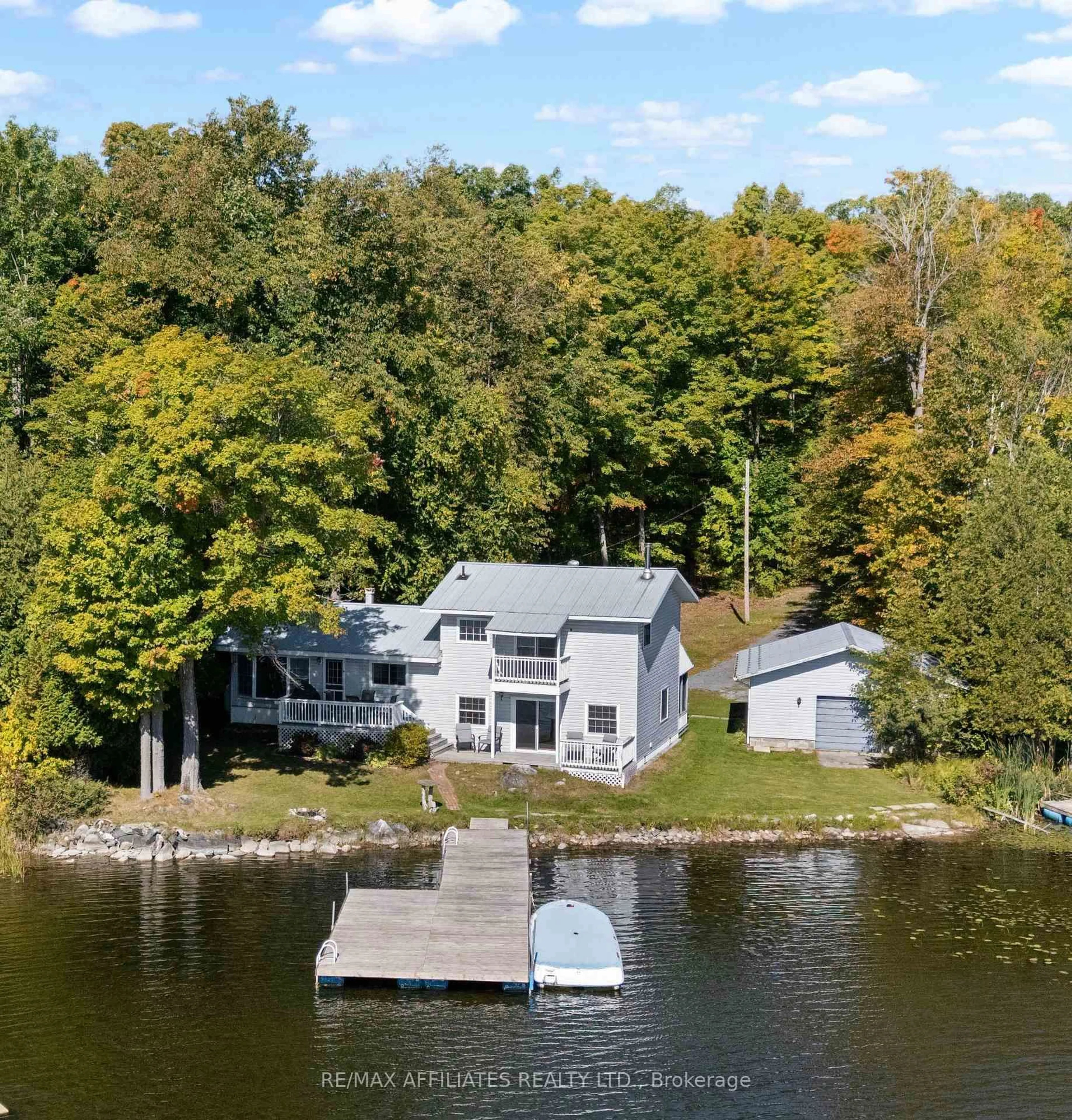 A pic from outside/outdoor area/front of a property/back of a property/a pic from drone, water/lake/river/ocean view for 363 Hardwood Ridge Rd, Lanark Ontario K0G 1K0