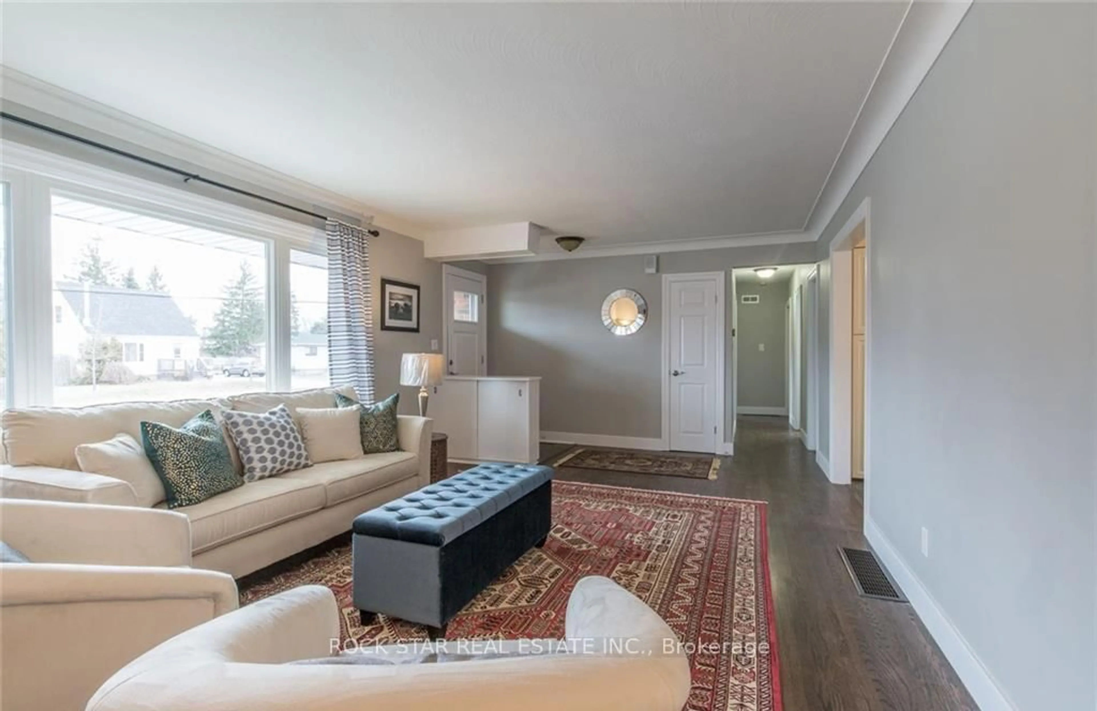 Living room with furniture, wood/laminate floor for 14 Dunsdon St, Brantford Ontario N3R 3J3
