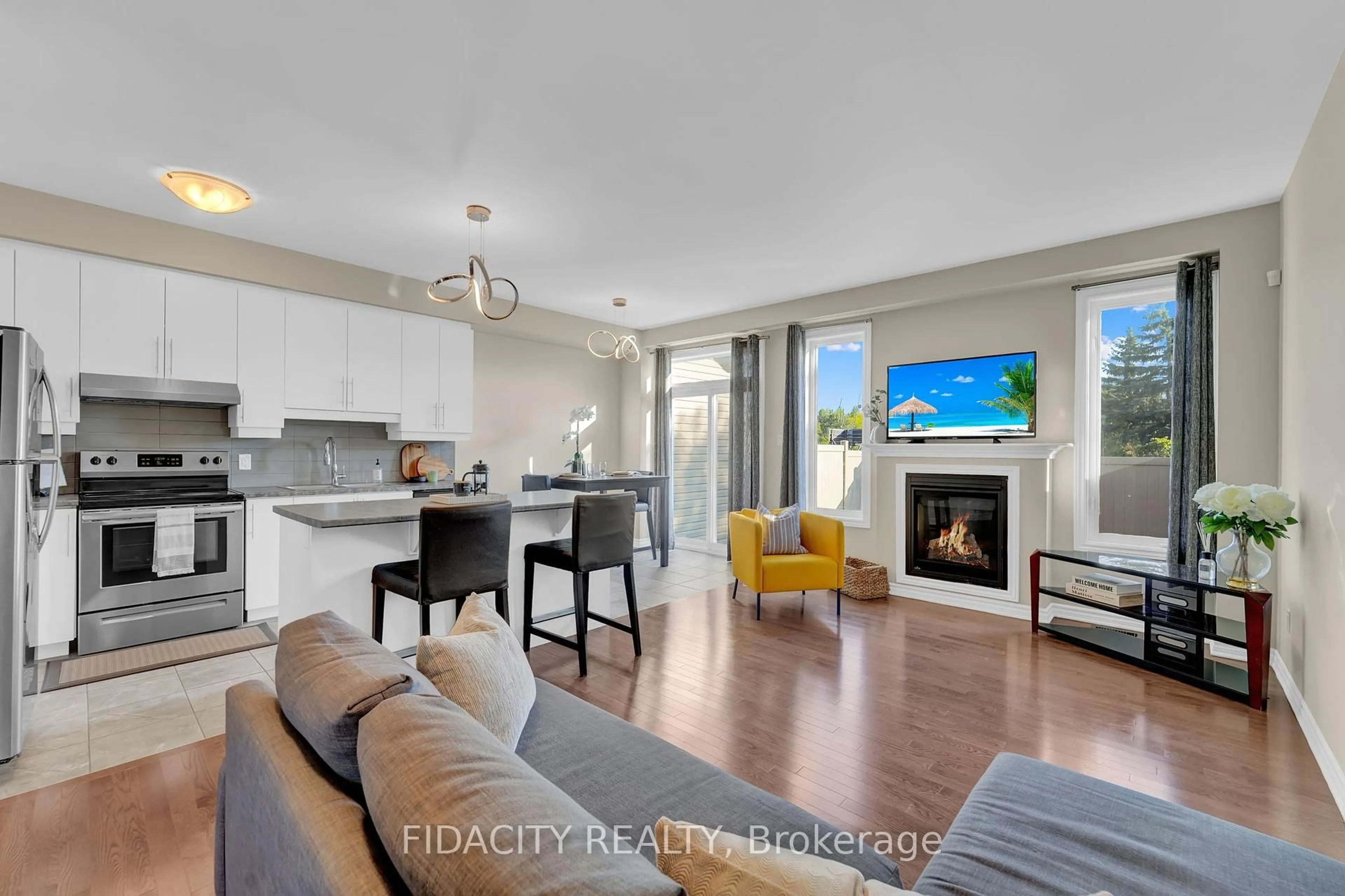 Open concept kitchen, wood/laminate floor for 503 Via Mattino Way, Ottawa Ontario K2J 6B7