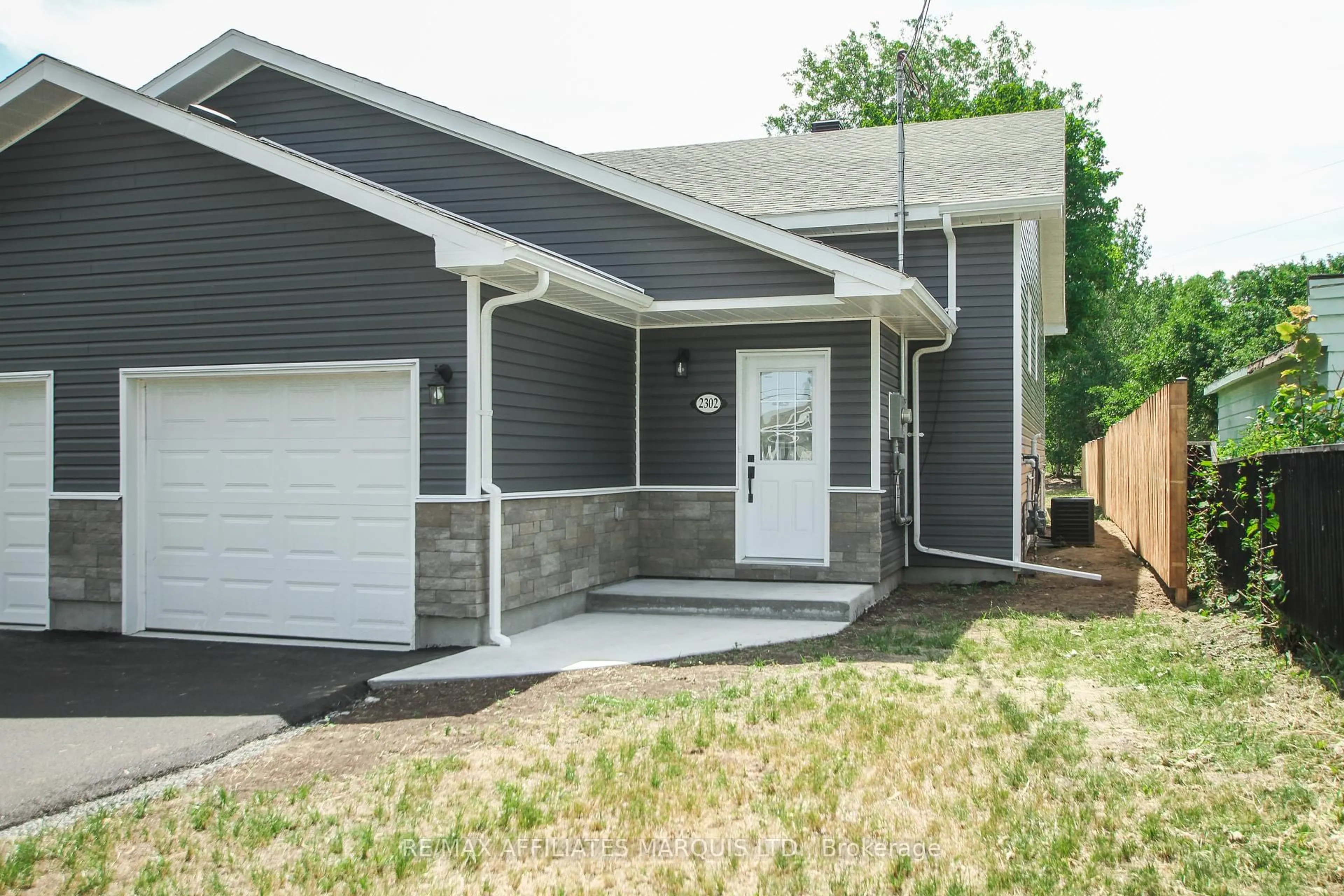 Home with vinyl exterior material, street for 2302 Tollgate Rd, Cornwall Ontario K6H 5R6
