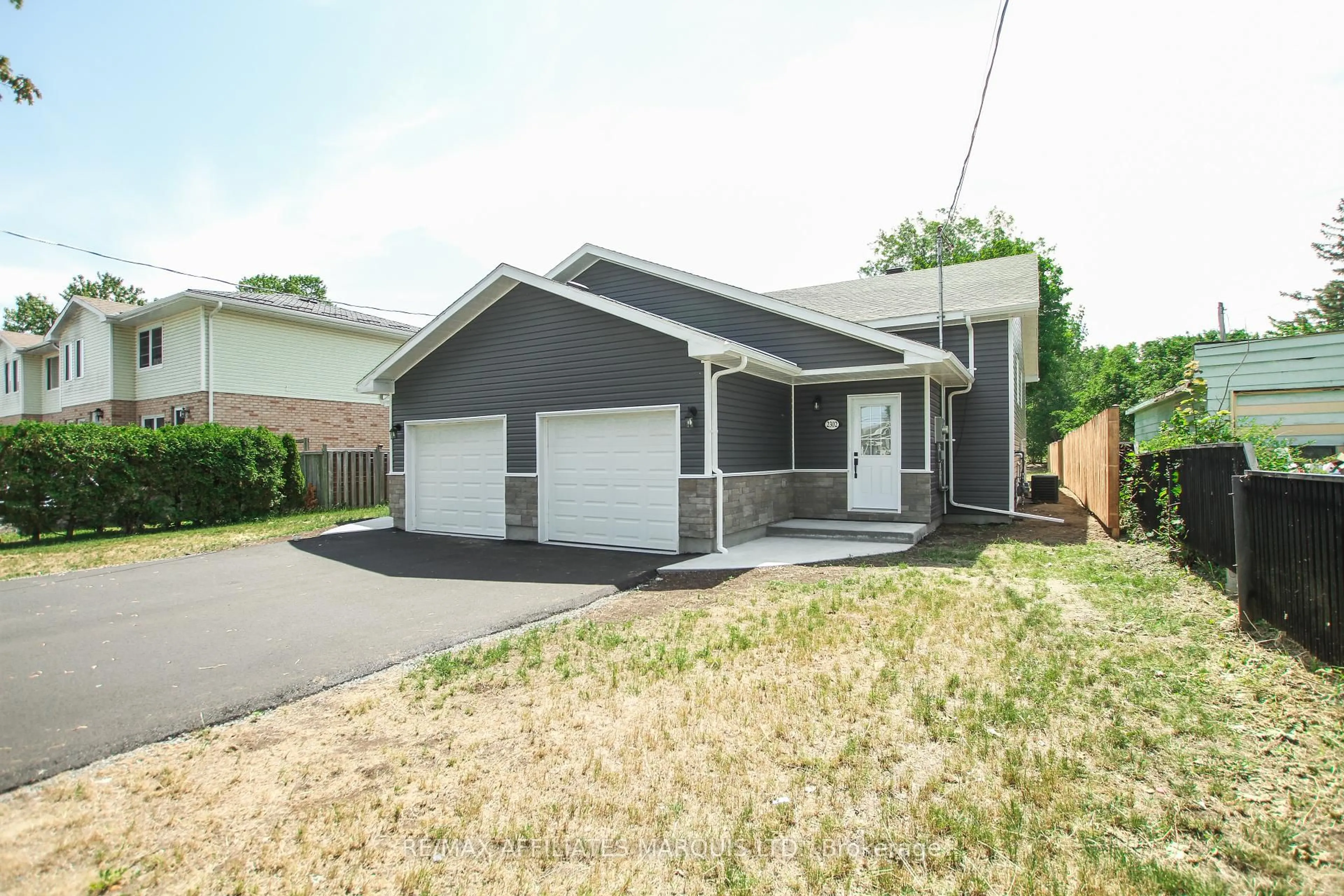 Home with vinyl exterior material, street for 2302 Tollgate Rd, Cornwall Ontario K6H 5R6