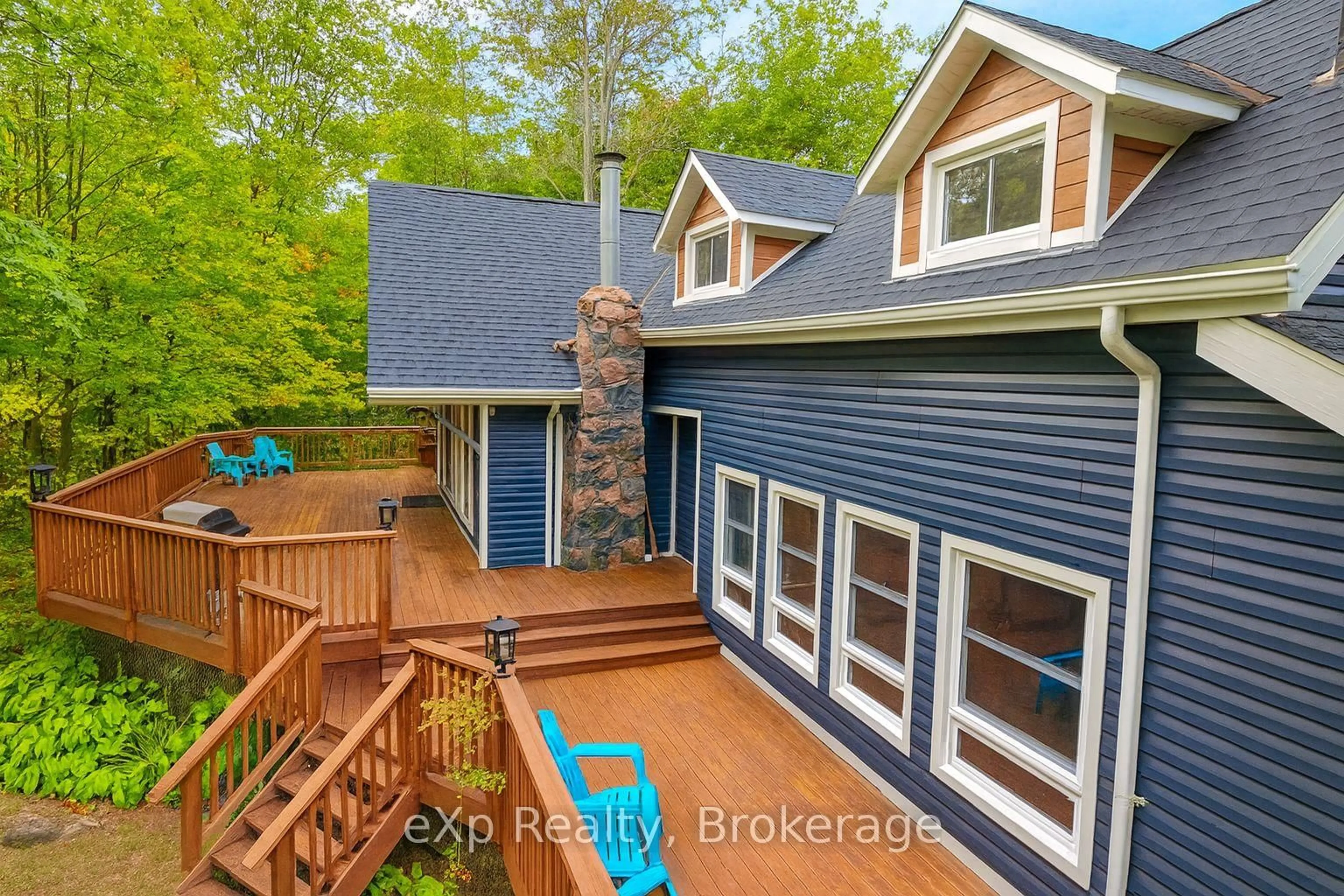 A pic from outside/outdoor area/front of a property/back of a property/a pic from drone, water/lake/river/ocean view for 1382 Muskoka Rd 169, Gravenhurst Ontario P1P 1R2