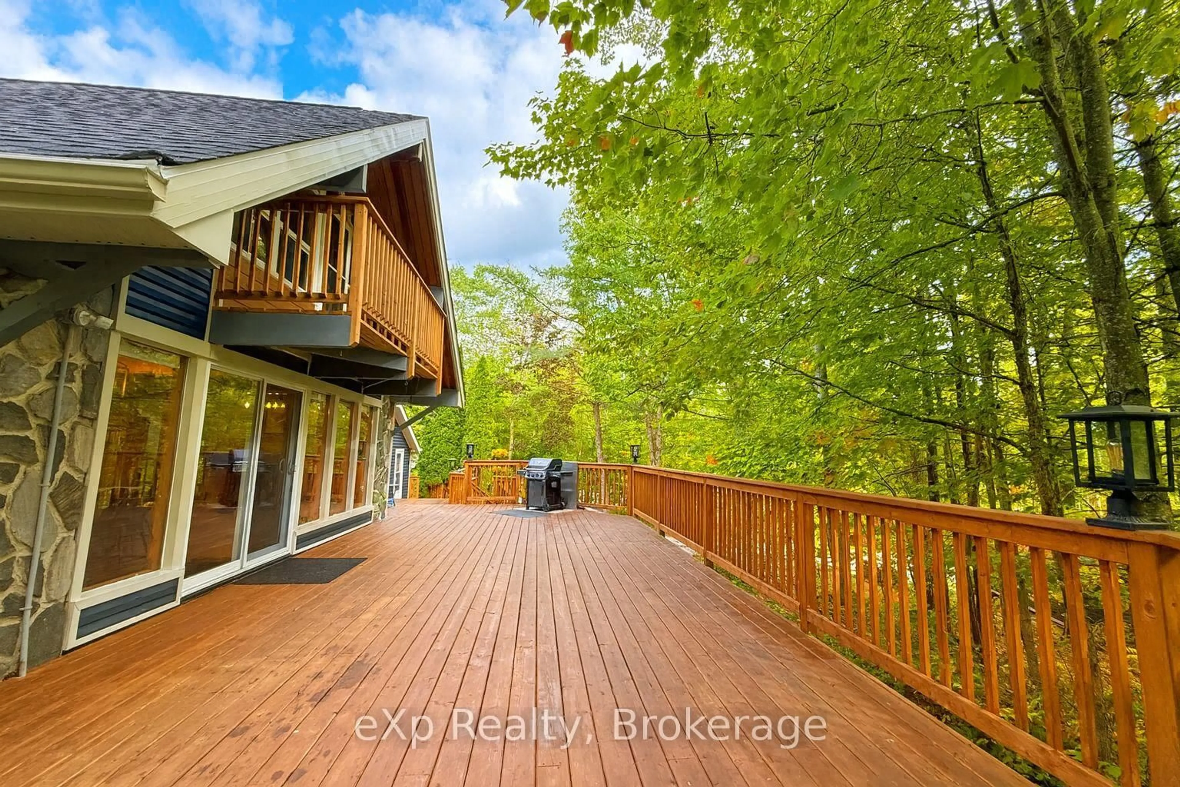 A pic from outside/outdoor area/front of a property/back of a property/a pic from drone, forest/trees view for 1382 Muskoka Rd 169, Gravenhurst Ontario P1P 1R2