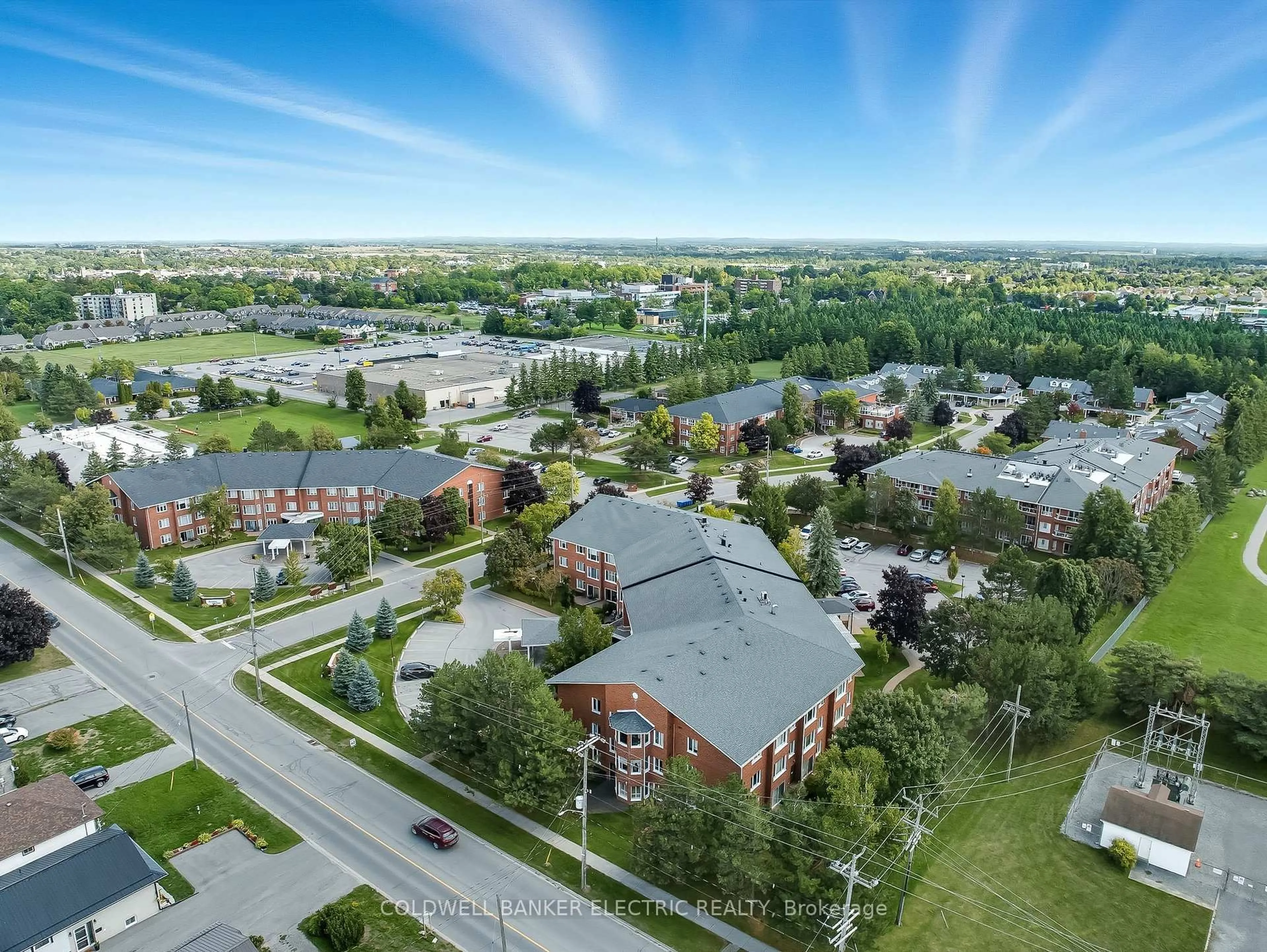A pic from outside/outdoor area/front of a property/back of a property/a pic from drone, unknown for 1 Heritage Way #301, Kawartha Lakes Ontario K9V 5P9