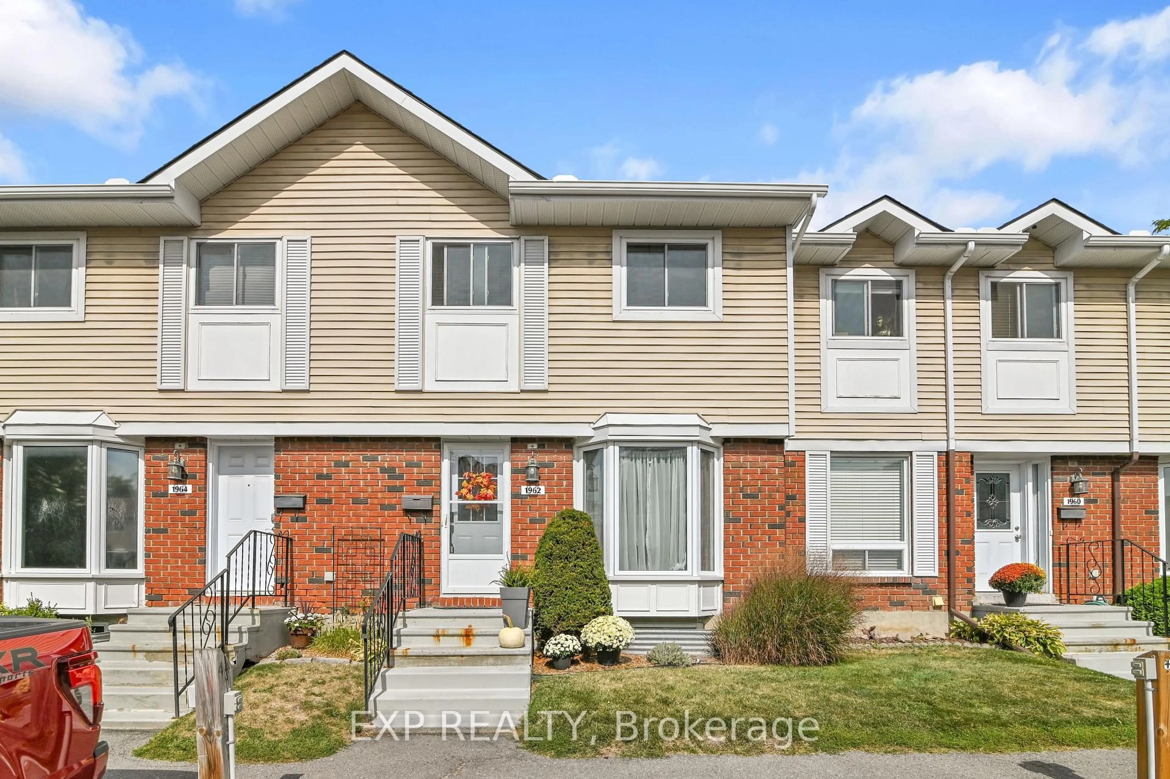 Home with brick exterior material, street for 1962 Greenvale Lane, Ottawa Ontario K1C 6E3