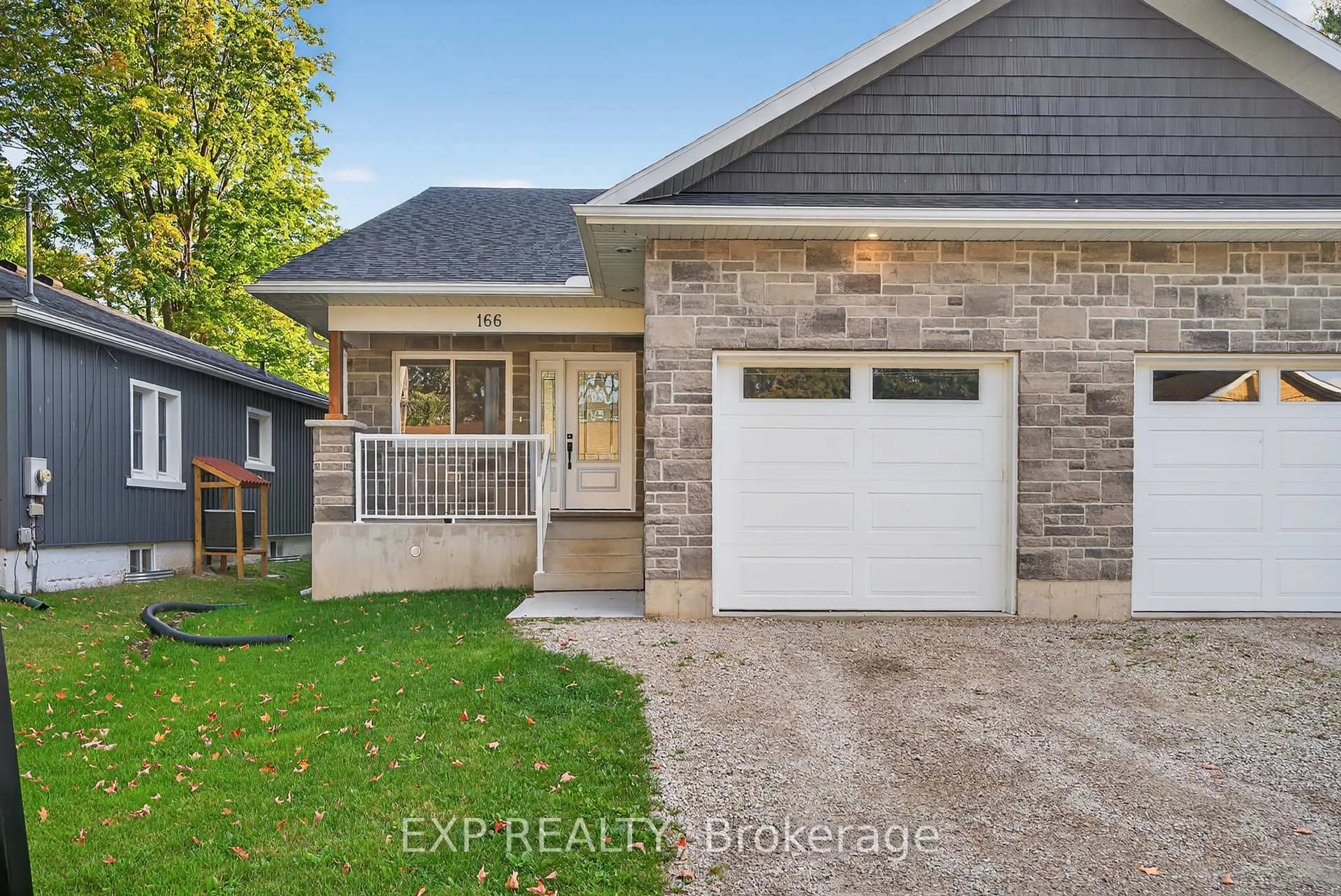 Home with brick exterior material, street for 166 Webb St, Minto Ontario N0G 1Z0