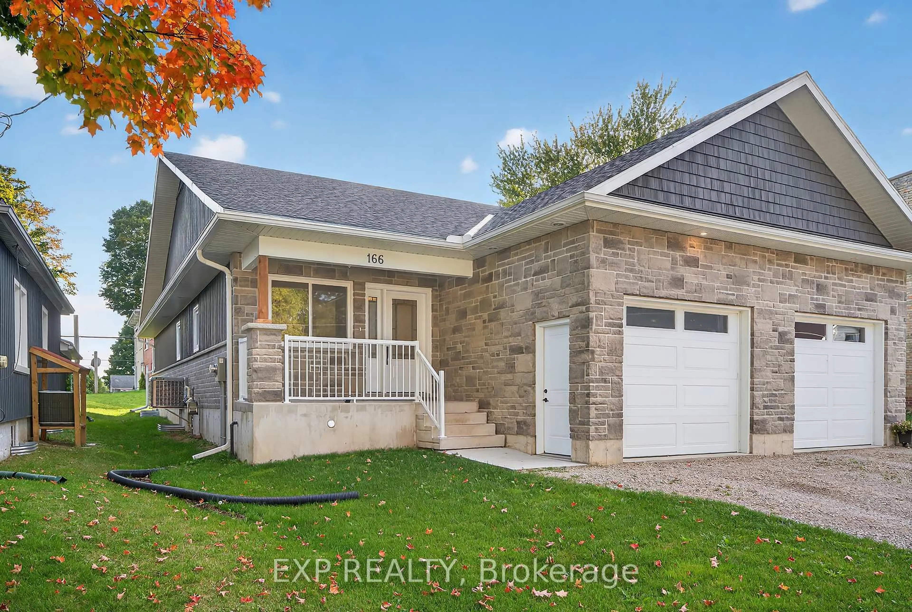 Home with vinyl exterior material, street for 166 Webb St, Minto Ontario N0G 1Z0