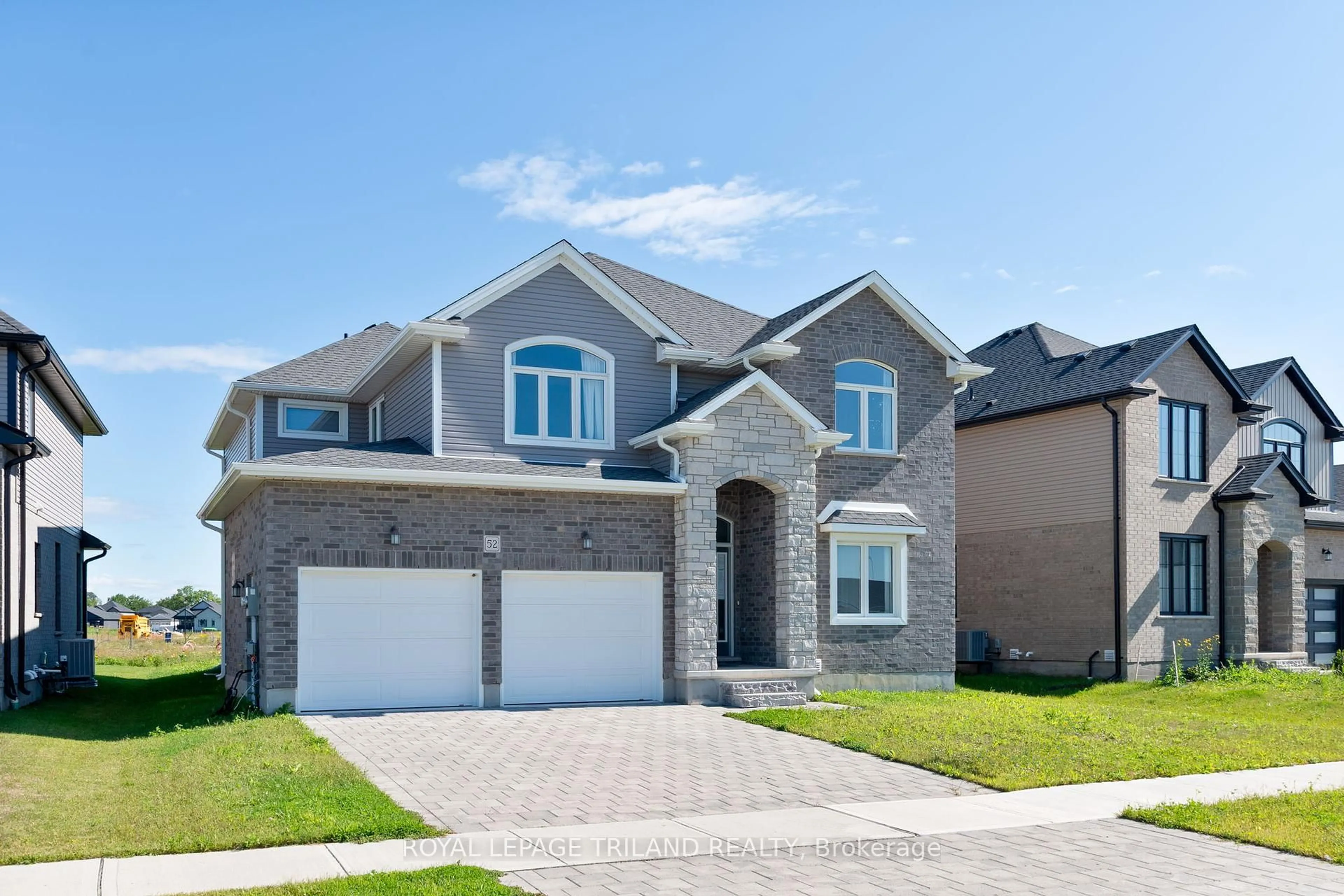 Home with brick exterior material, street for 52 OPTIMIST Dr, Southwold Ontario N5P 0G4