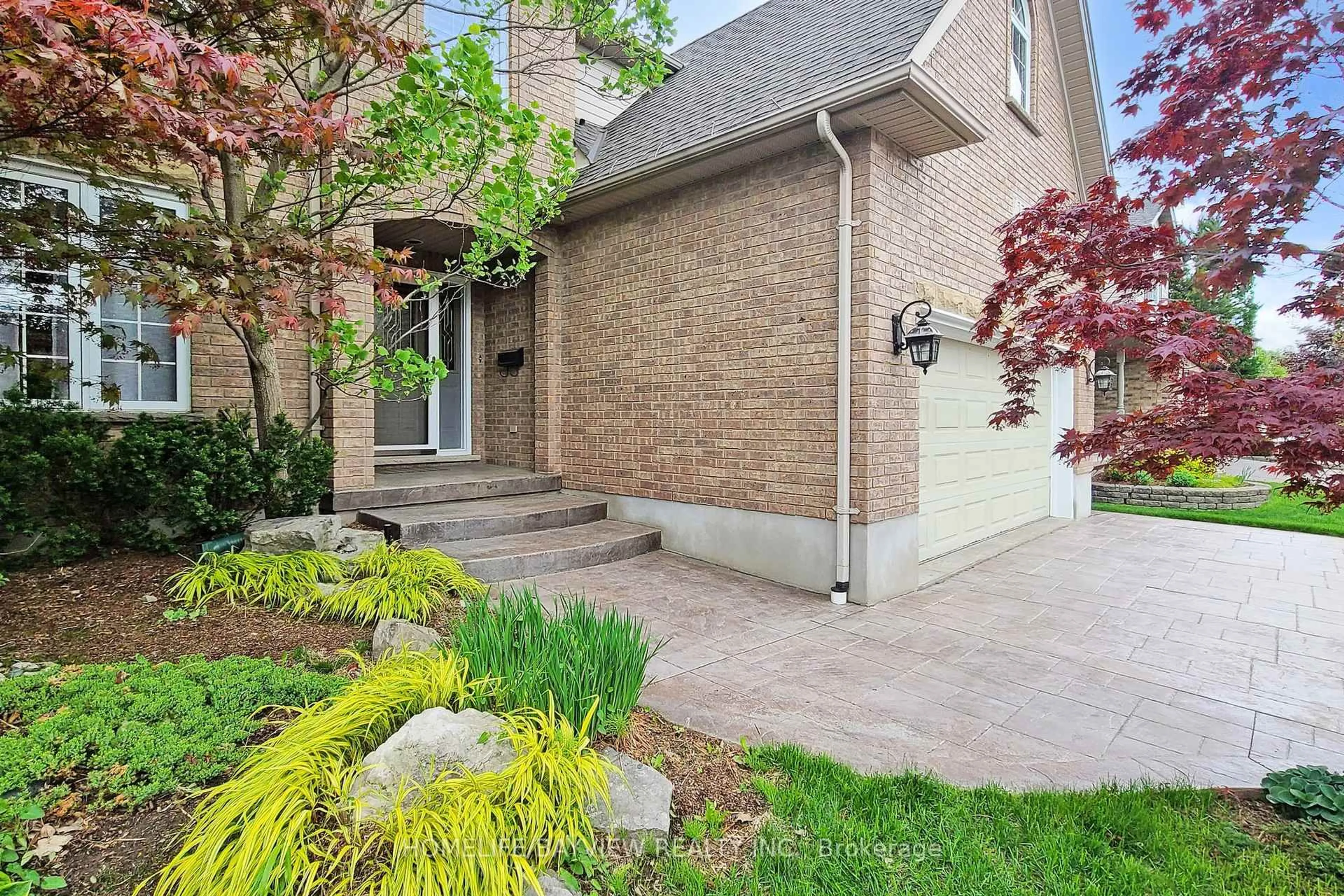 Home with brick exterior material, street for 574 Sandbanks Cres, Waterloo Ontario N2V 2K2