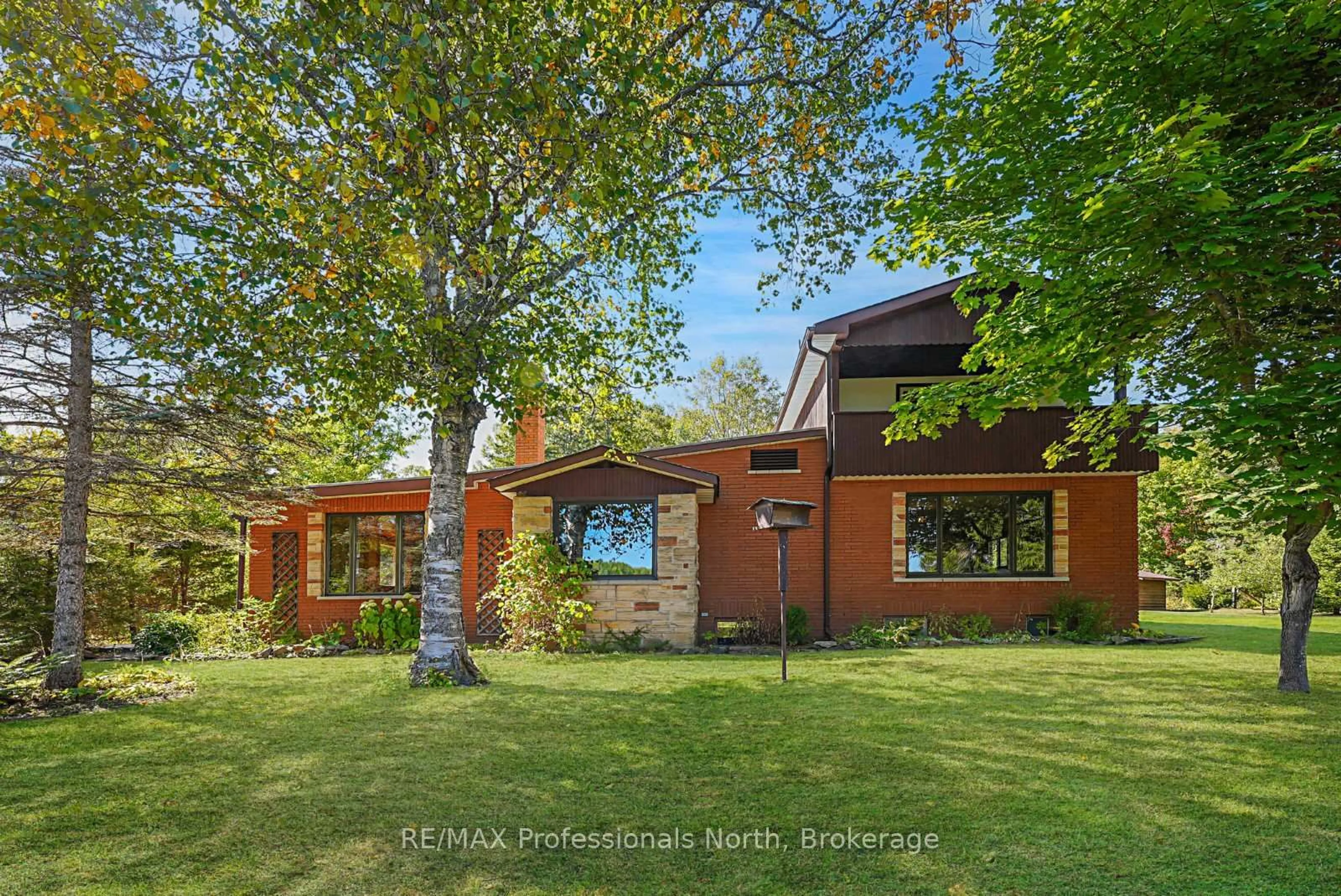 Home with brick exterior material, street for 1093 Dark Lake Rd, Highlands East Ontario K0L 3C0